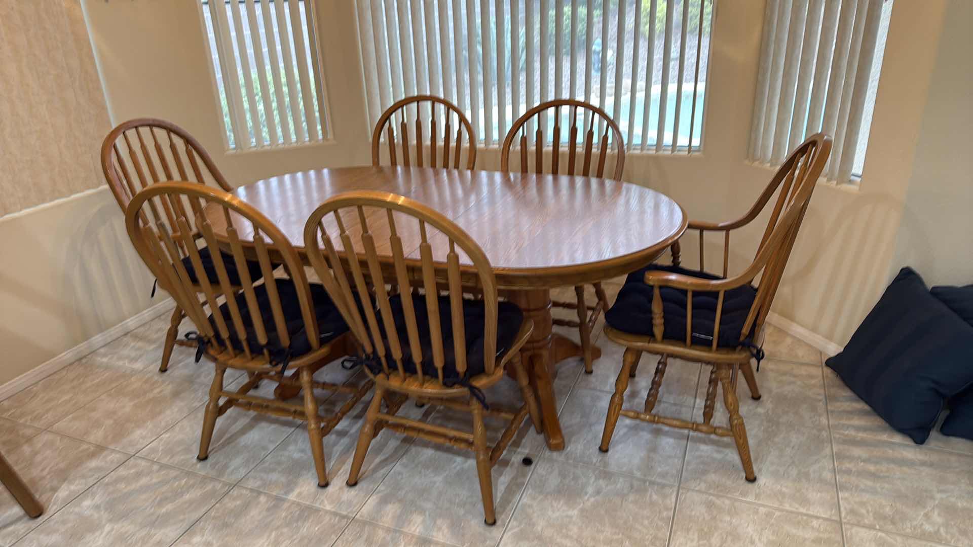 Photo 1 of OAK DINING TABLE W 6 WINDSOR CHAIRS (2 ARM CHAIRS & 4 SIDE) 70”x42” H29”