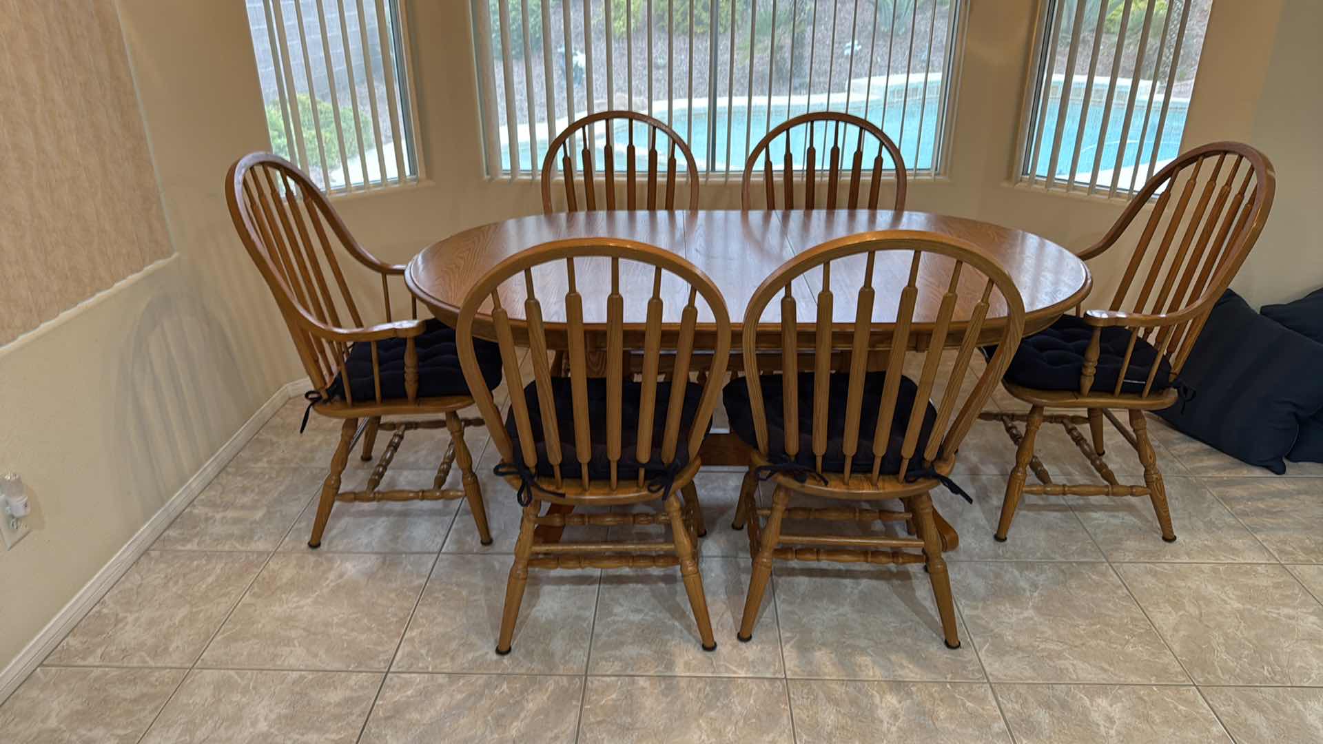 Photo 1 of OAK DINING TABLE W 6 WINDSOR CHAIRS (2 ARM CHAIRS & 4 SIDE) 70”x42” H29”