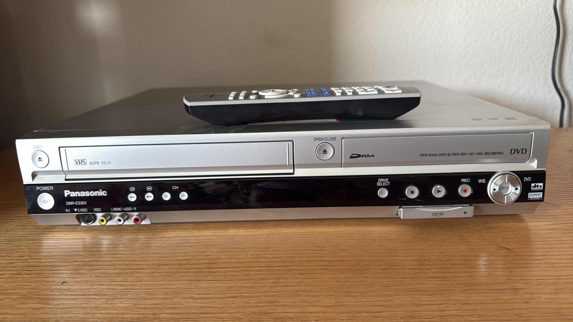 Photo 1 of PANASONIC DMR-ES35V VHS & DVD PLAYER W REMOTE