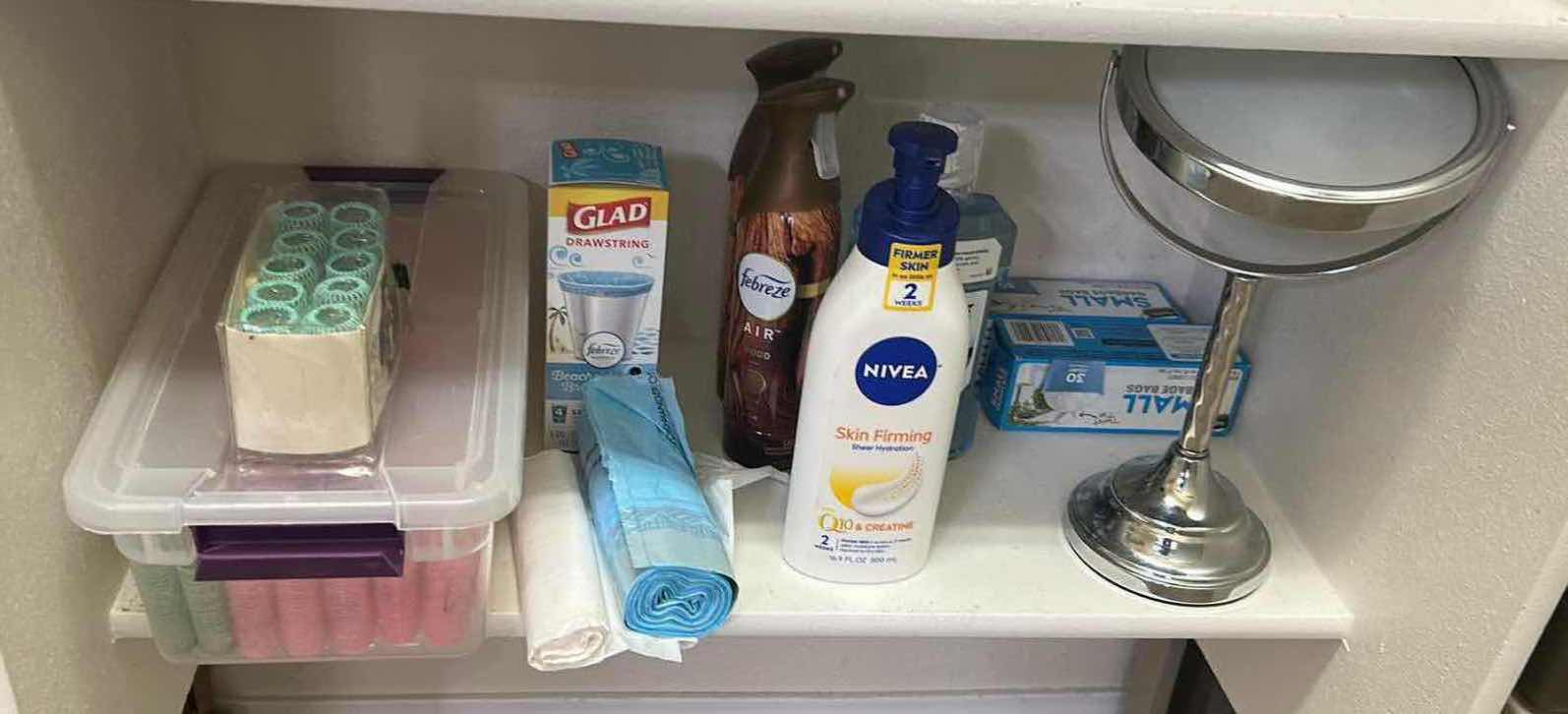 Photo 1 of CONTENTS OF SHELF MIRROR TRASH BAGS FEBREZE