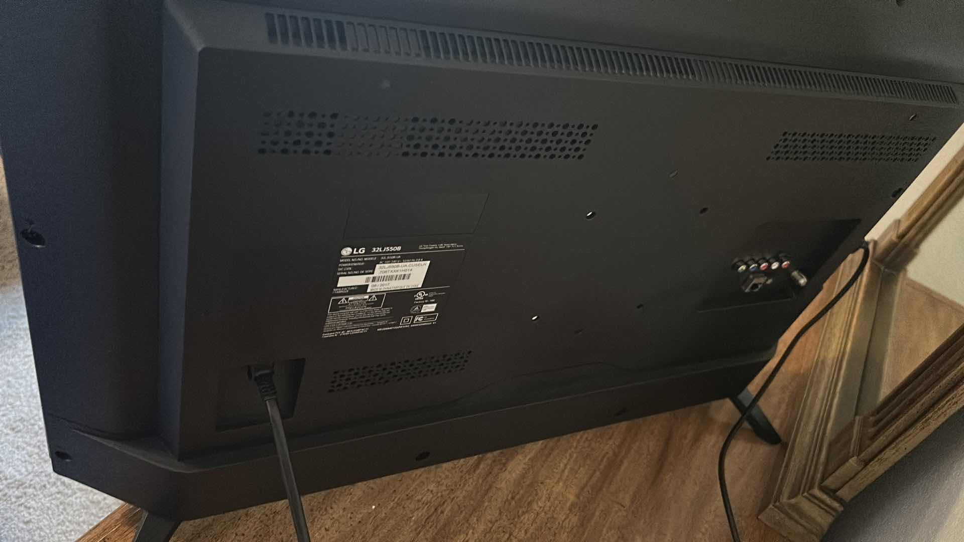 Photo 1 of LG 32” TV W REMOTE AND STAND