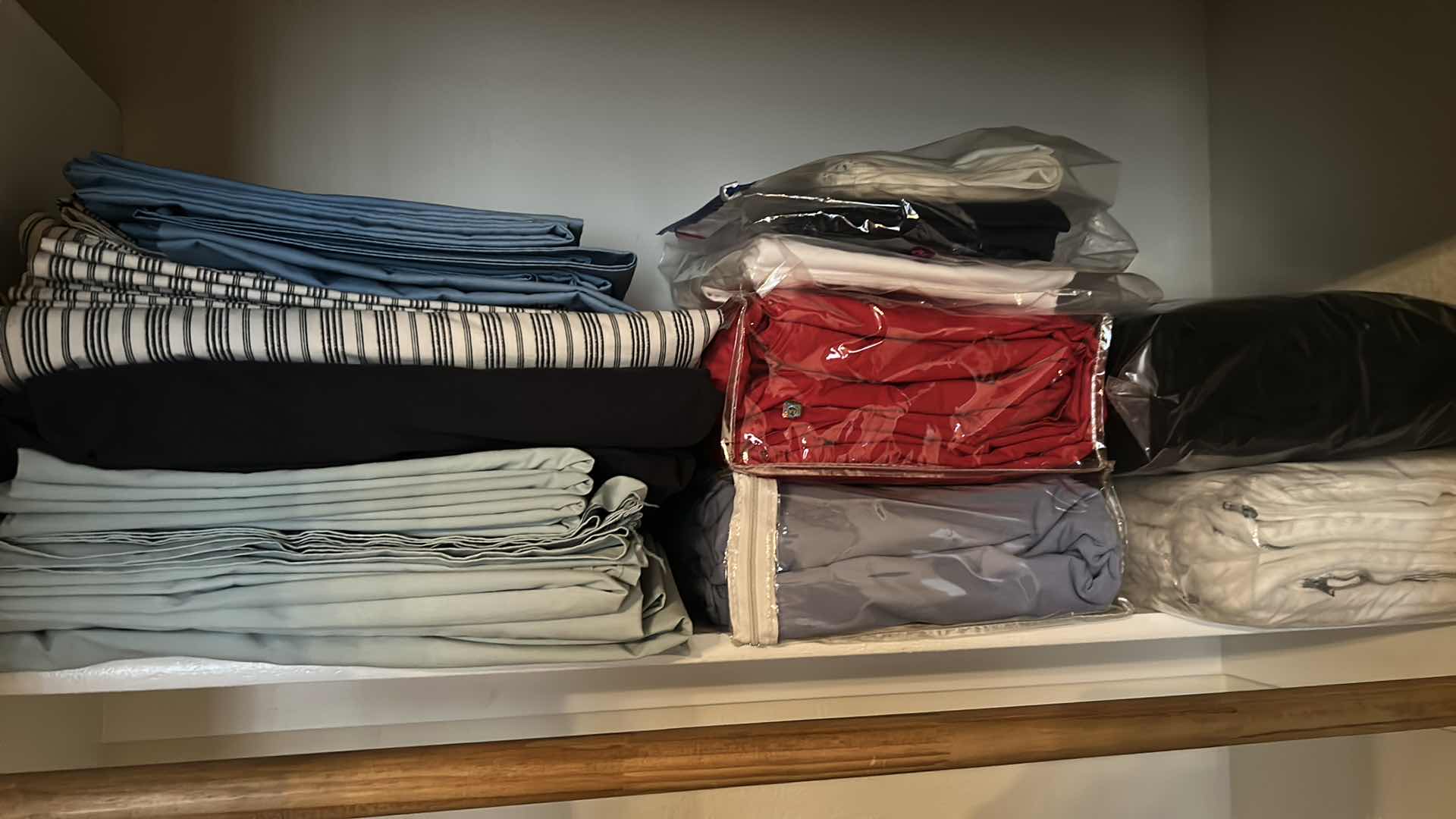 Photo 1 of CONTENTS OF CLOSET LINEN BLANKETS PILLOWS