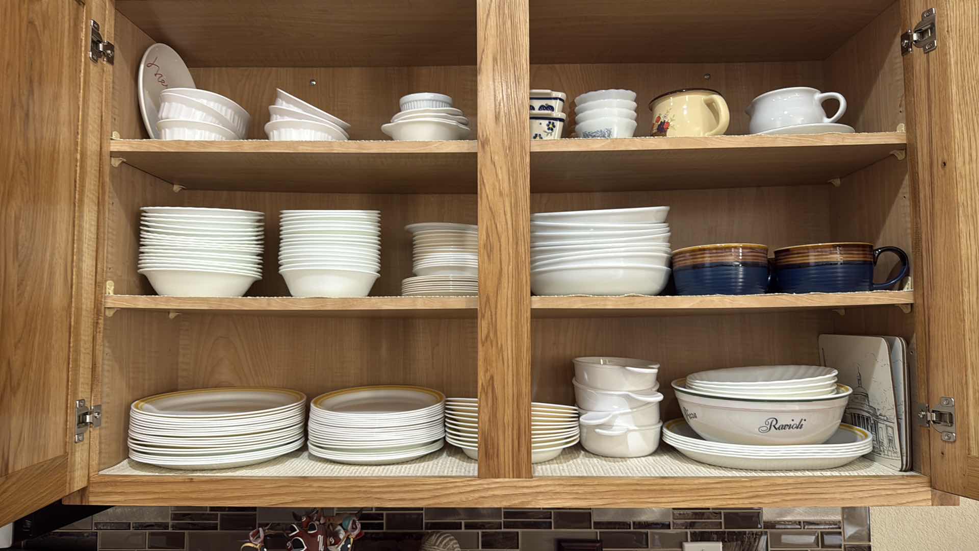 Photo 1 of CONTENTS OF KITCHEN CABINET-CORELLE BY CORNING DISHWARE