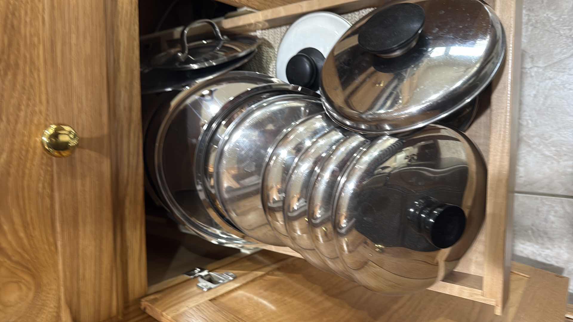 Photo 1 of CONTENTS OF KITCHEN CABINET-POT & PANS