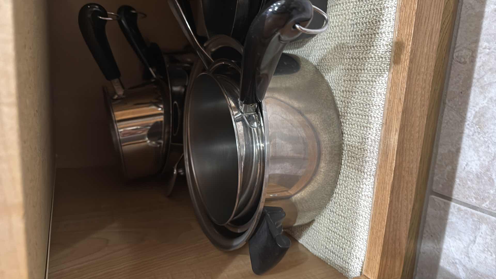 Photo 1 of CONTENTS OF KITCHEN CABINET-POT & PANS