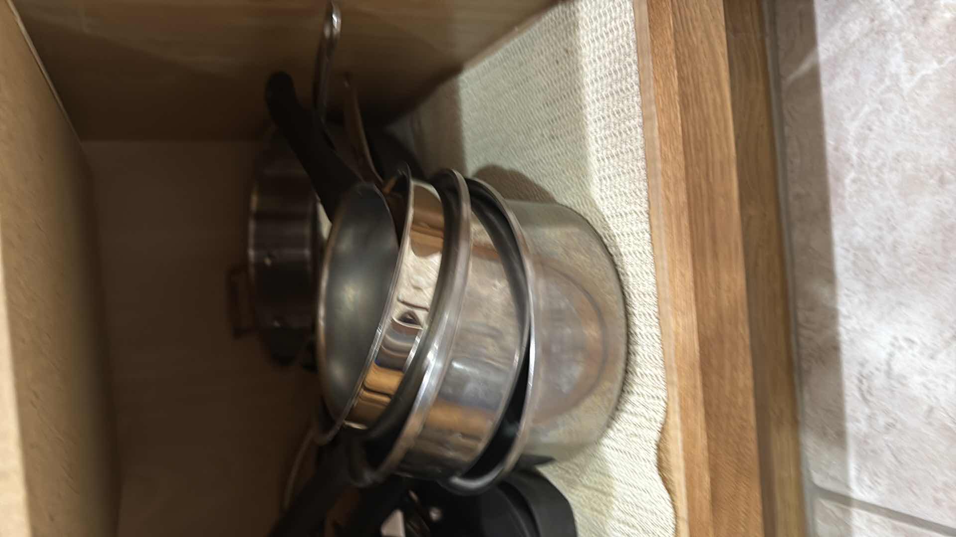 Photo 1 of CONTENTS OF KITCHEN CABINET-POT & PANS