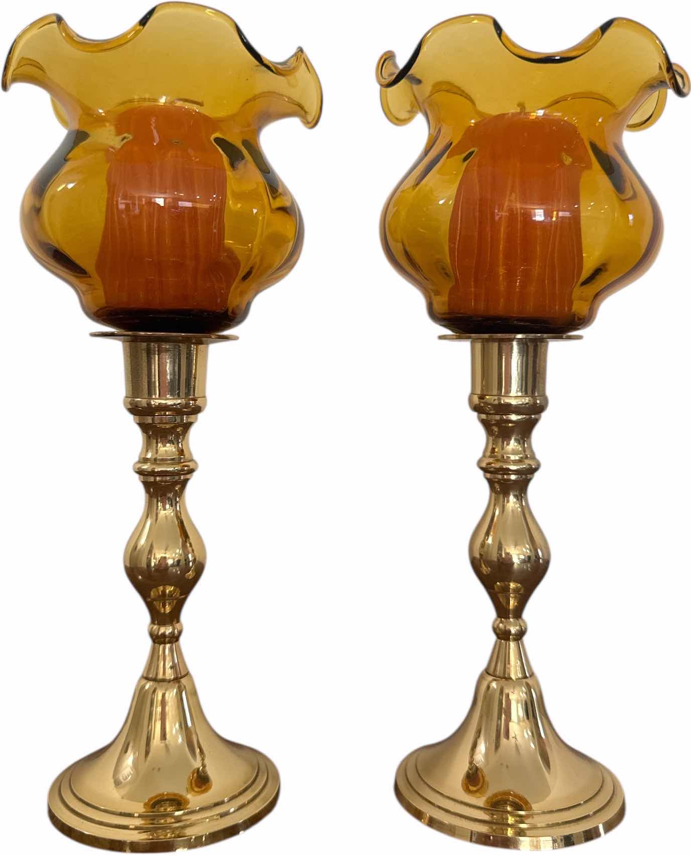 Photo 1 of 2- VINTAGE AMBER GLASS CANDLE HOLDERS
H8.5”
