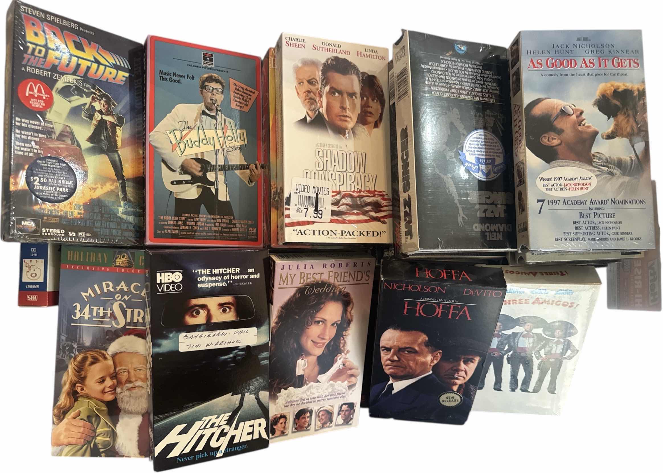 Photo 1 of CONTENTS OF TOTE VINTAGE ASSORTED VHS COLLECTION