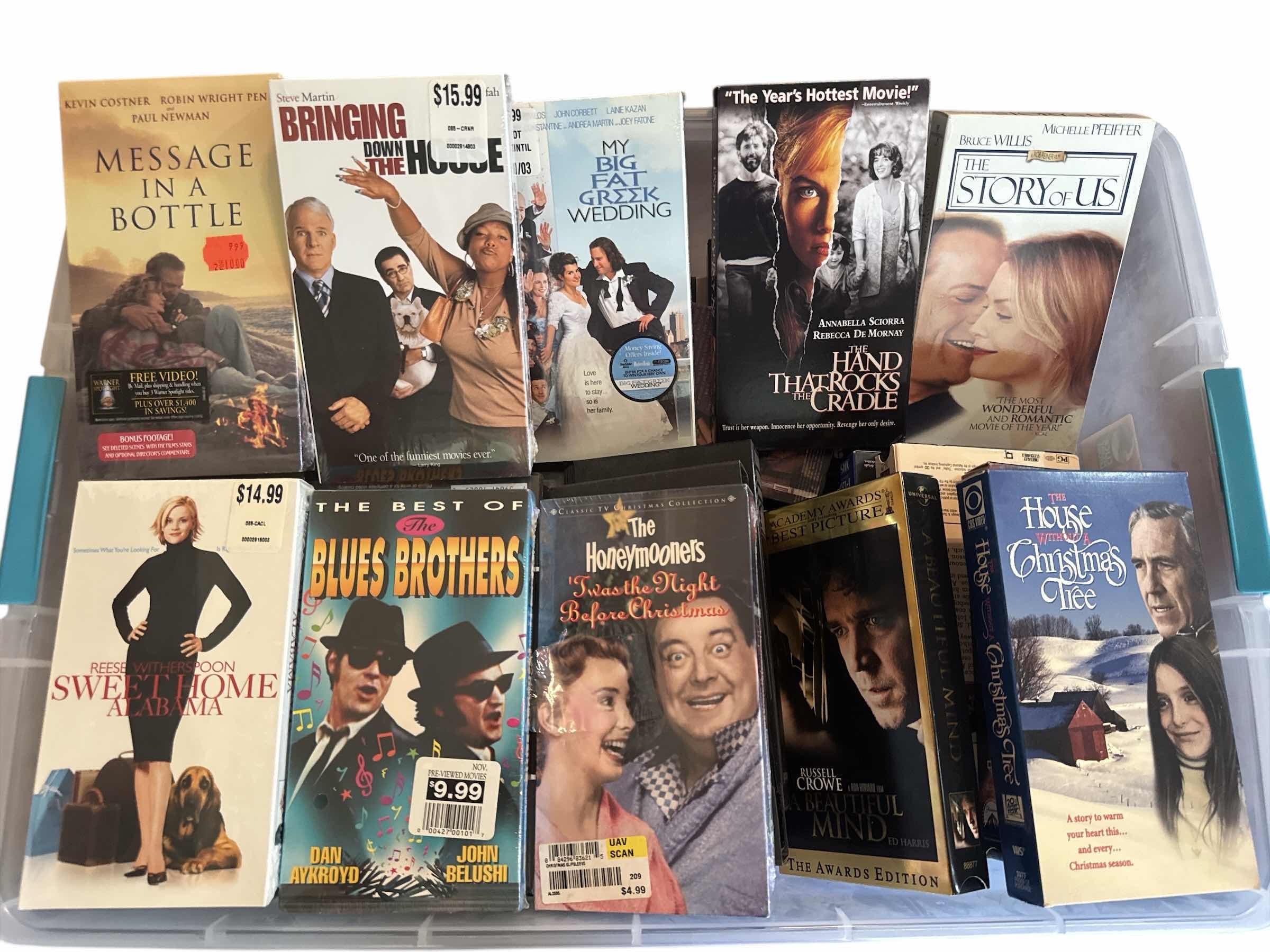 Photo 1 of CONTENTS OF TOTE VINTAGE ASSORTED VHS COLLECTION