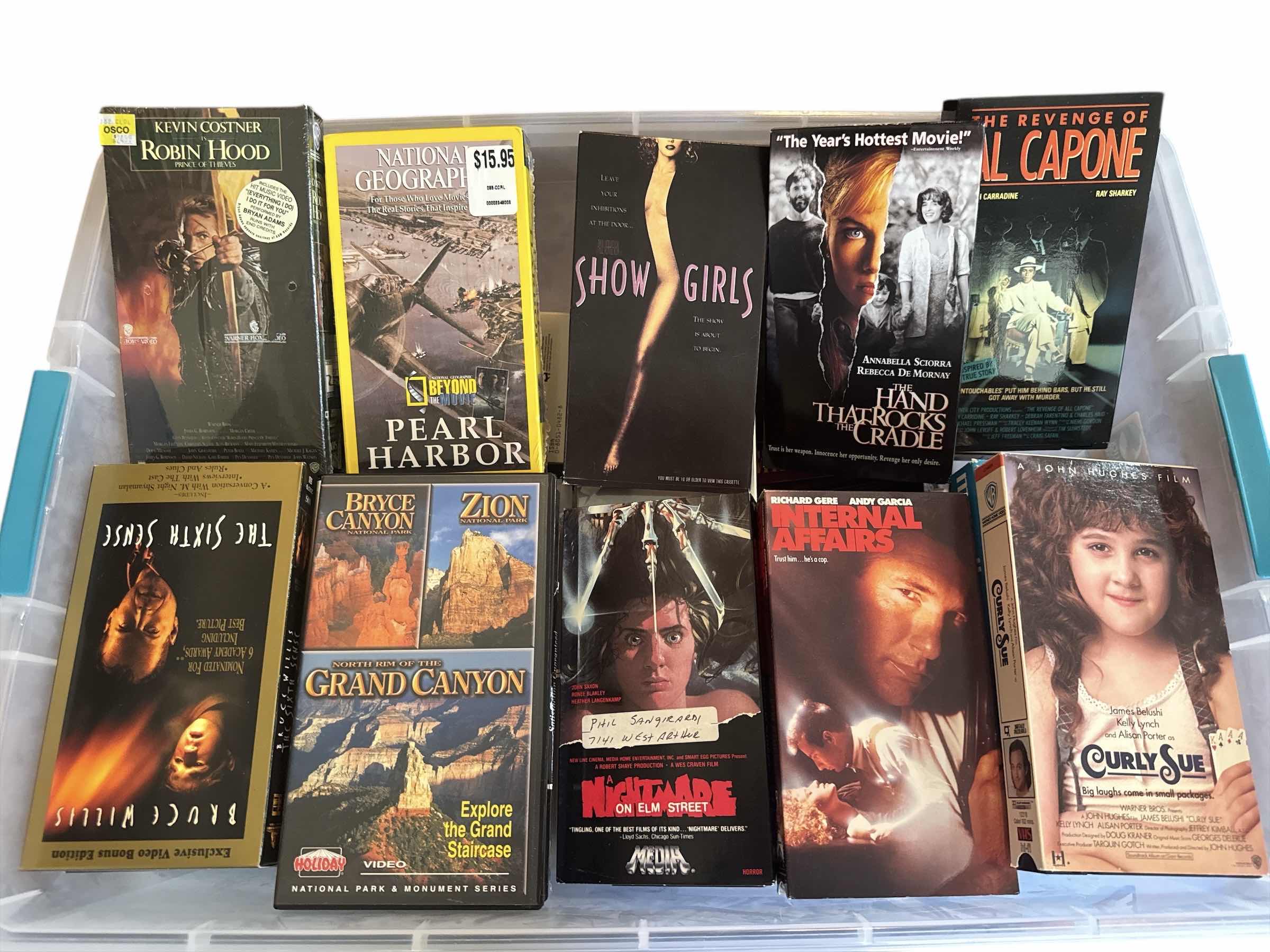 Photo 1 of CONTENTS OF TOTE VINTAGE ASSORTED VHS COLLECTION