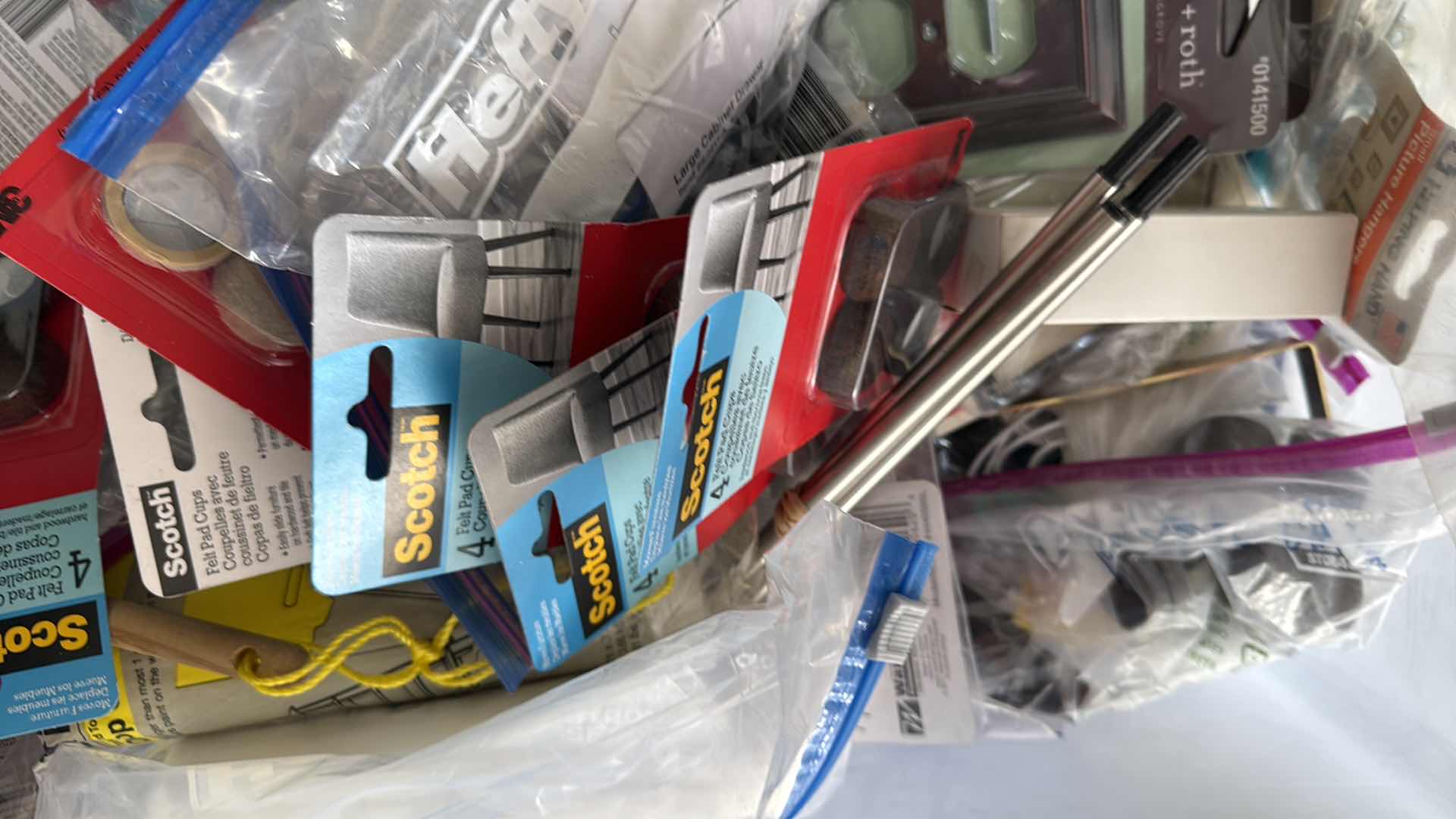 Photo 1 of CONTENTS OF TOTE-GARAGE SUPPLIES, FIX IT ITEMS