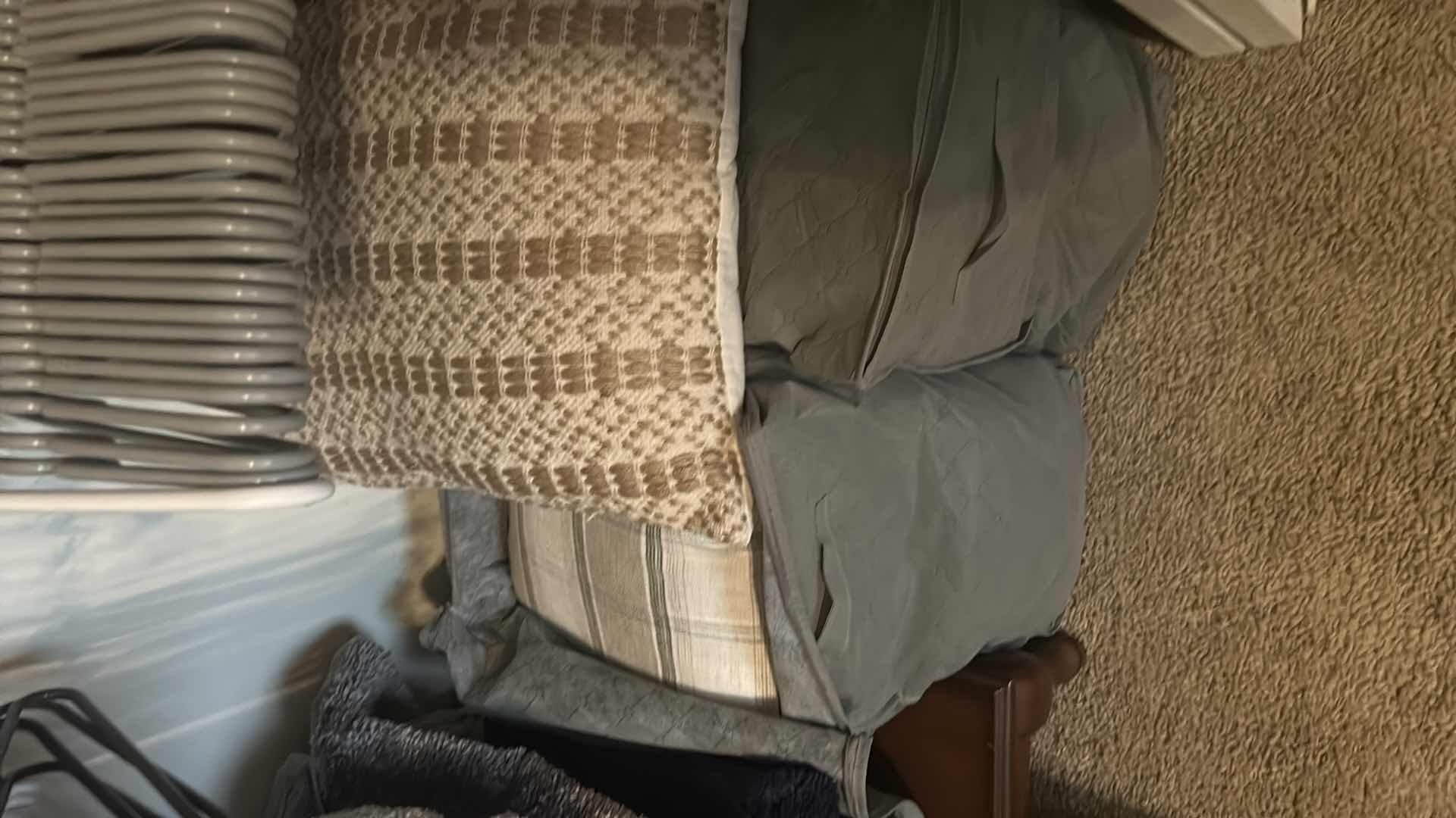 Photo 1 of CONTENTS OF CLOSET HANGERS ASSORTED FRAMES PILLOWS 2 WASTE  BASKETS 