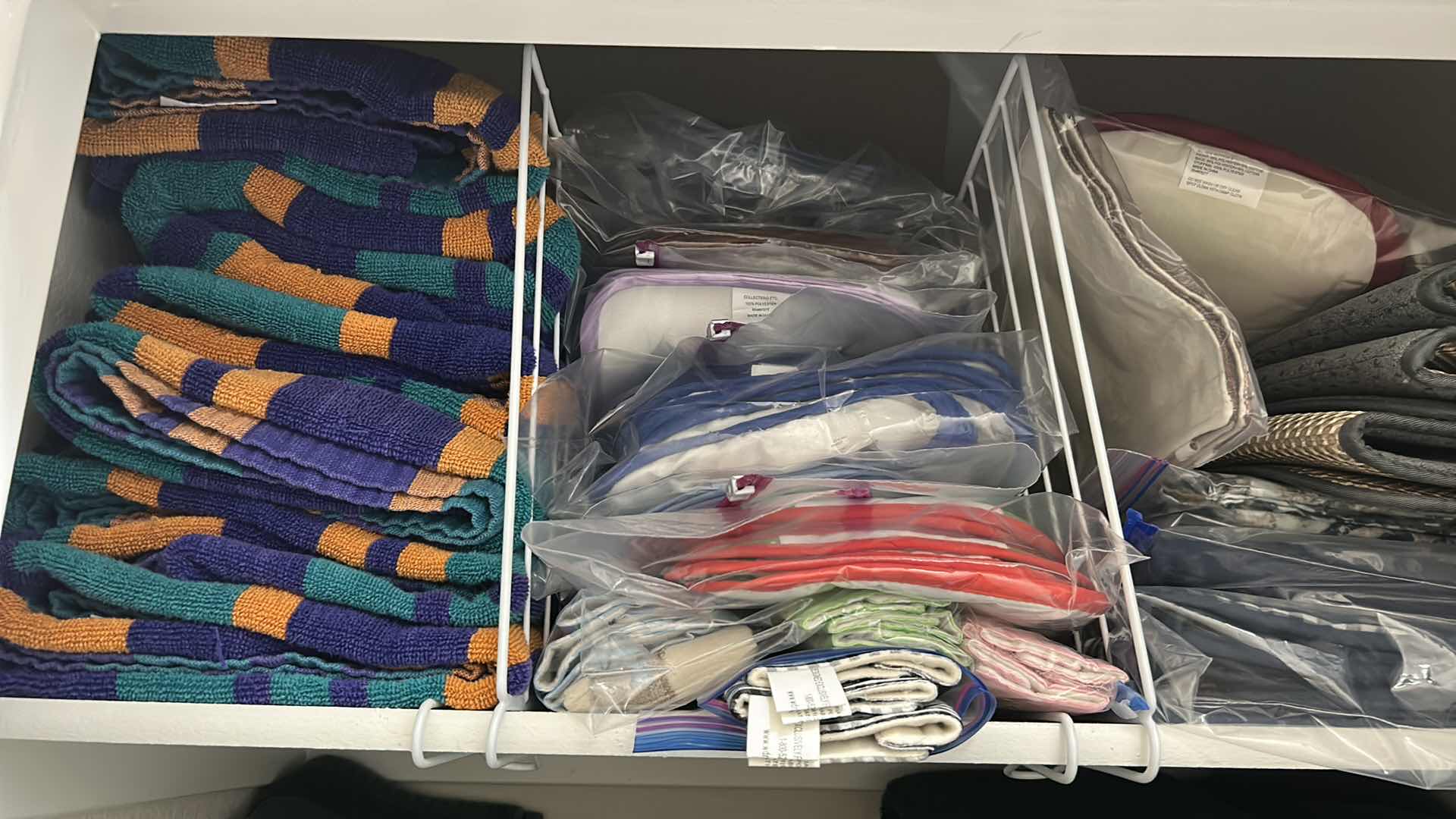 Photo 1 of CONTENTS OF SHELF BEACH TOWELS DECORATIVE KITCHEN OVEN MITTS DISH DRAINERS