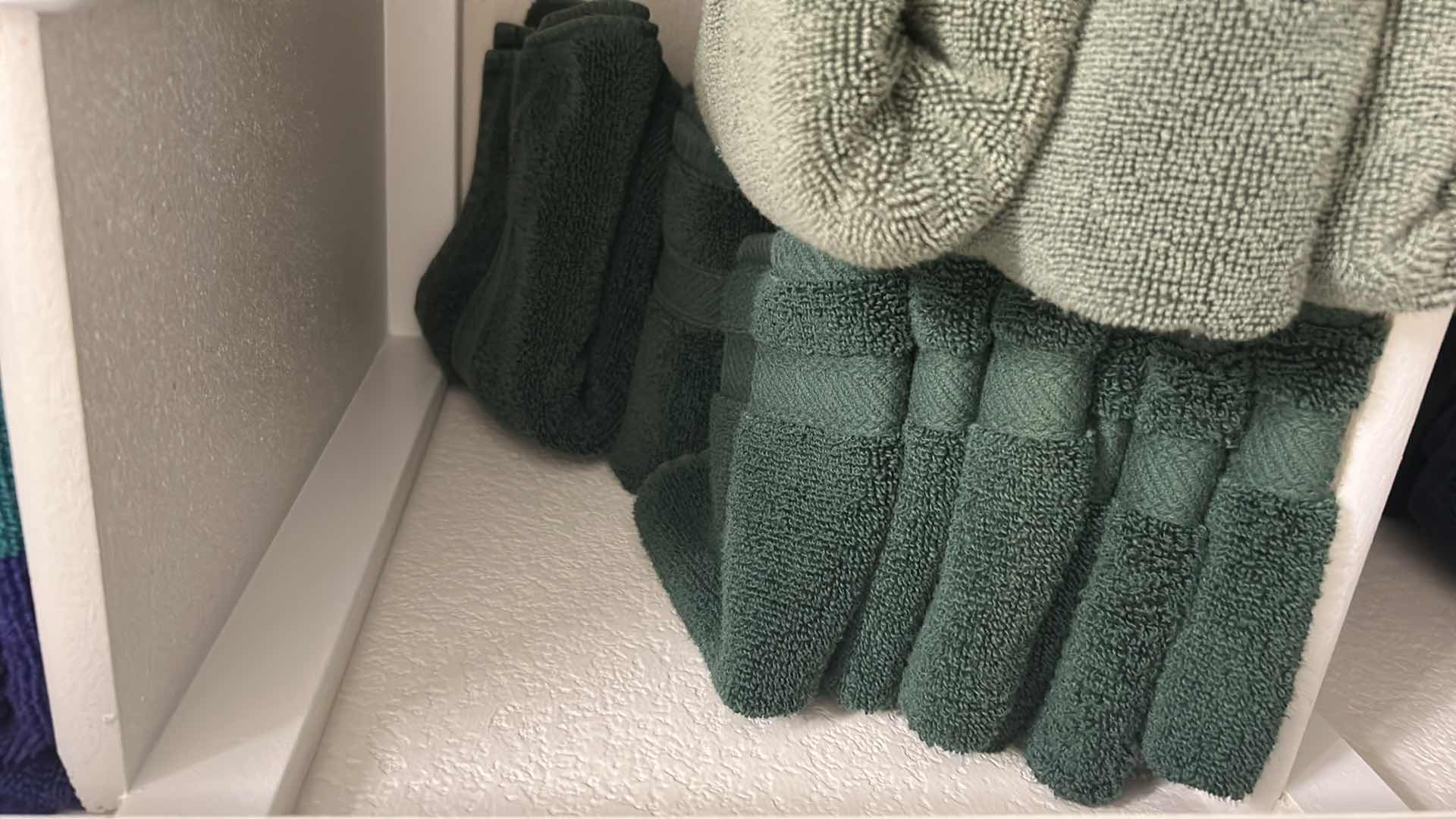 Photo 1 of CONTENTS OF SHELF GREEN BATH TOWELS ONLY