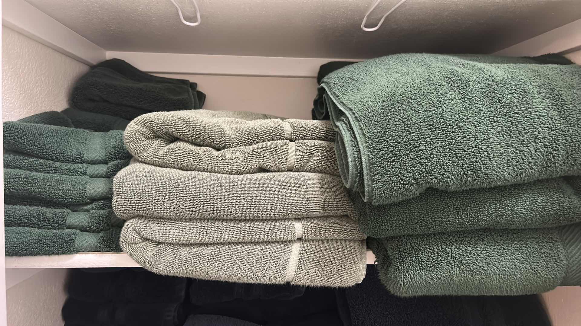 Photo 1 of CONTENTS OF SHELF GREEN BATH TOWELS ONLY