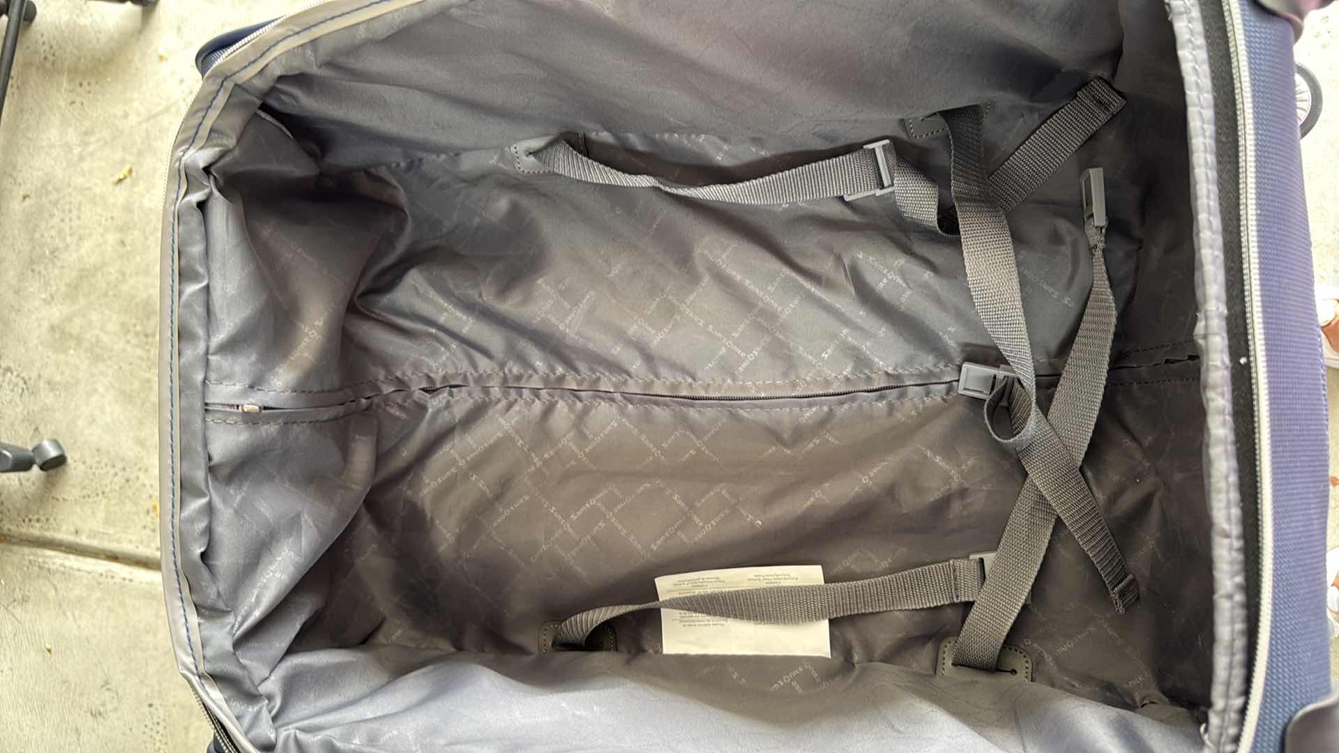 Photo 1 of SAMSONITE NAVY BLUE SOFTSIDE CARRY ON SPINNER LUGGAGE H23”