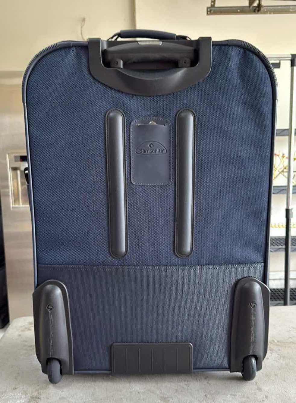 Photo 1 of SAMSONITE NAVY BLUE SOFTSIDE MEDIUM SPINNER LUGGAGE H27”