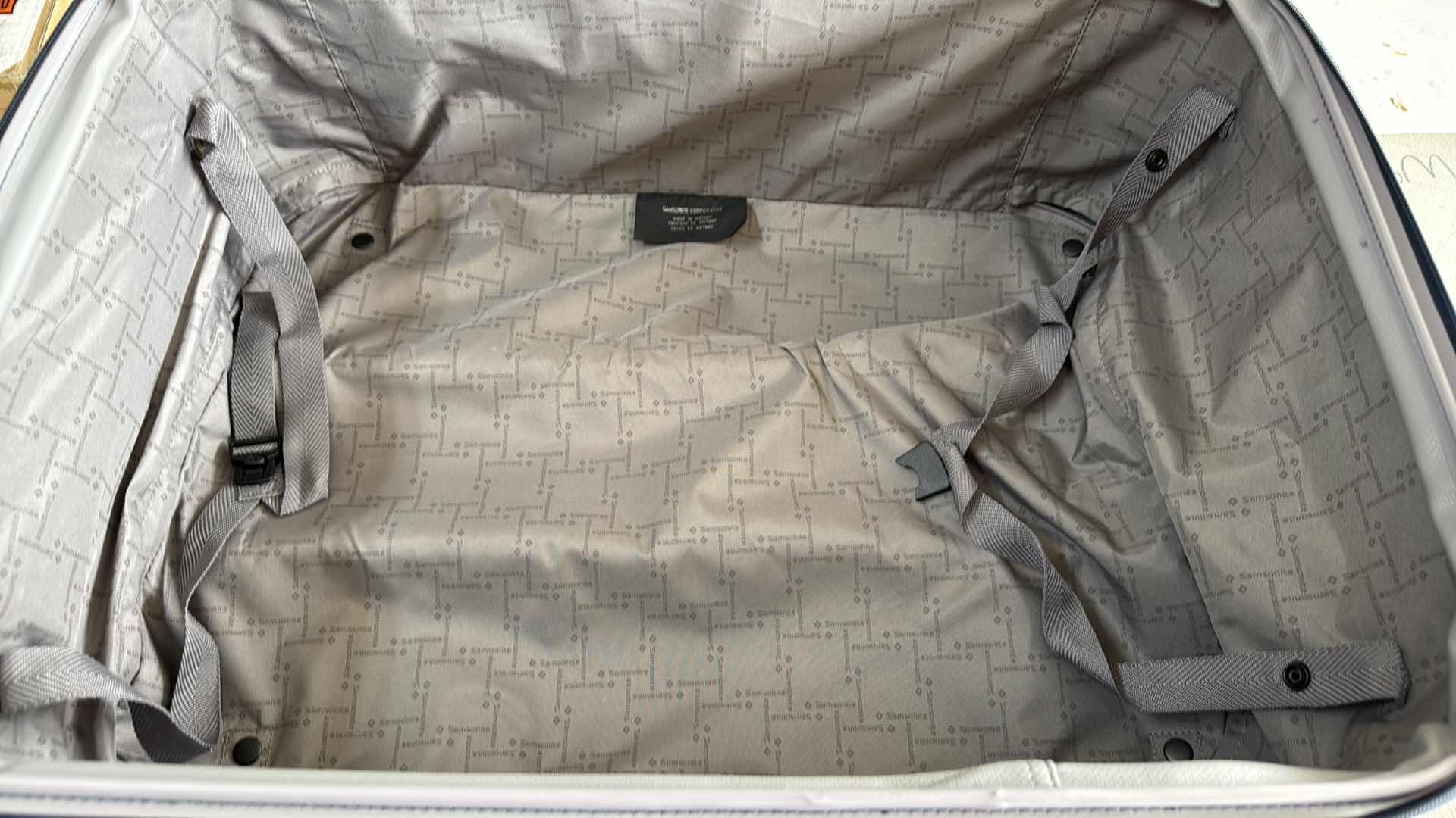 Photo 1 of SAMSONITE NAVY BLUE SOFTSIDE MEDIUM SPINNER LUGGAGE H27”