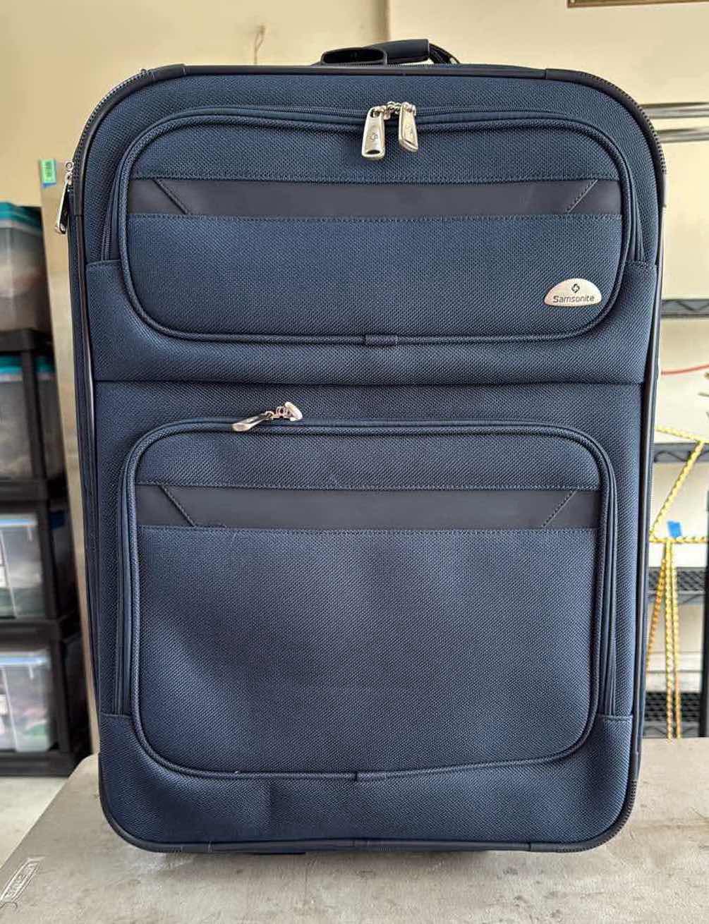 Photo 1 of SAMSONITE NAVY BLUE SOFTSIDE MEDIUM SPINNER LUGGAGE H27”