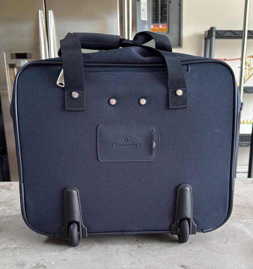 Photo 1 of SAMSONITE NAVY BLUE SOFTSIDE CARRY ON SPINNER W19” H16”