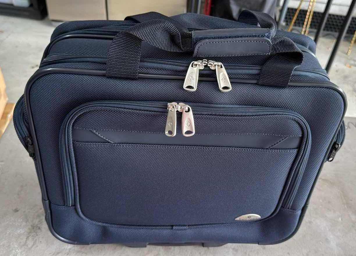 Photo 1 of SAMSONITE NAVY BLUE SOFTSIDE CARRY ON SPINNER W19” H16”