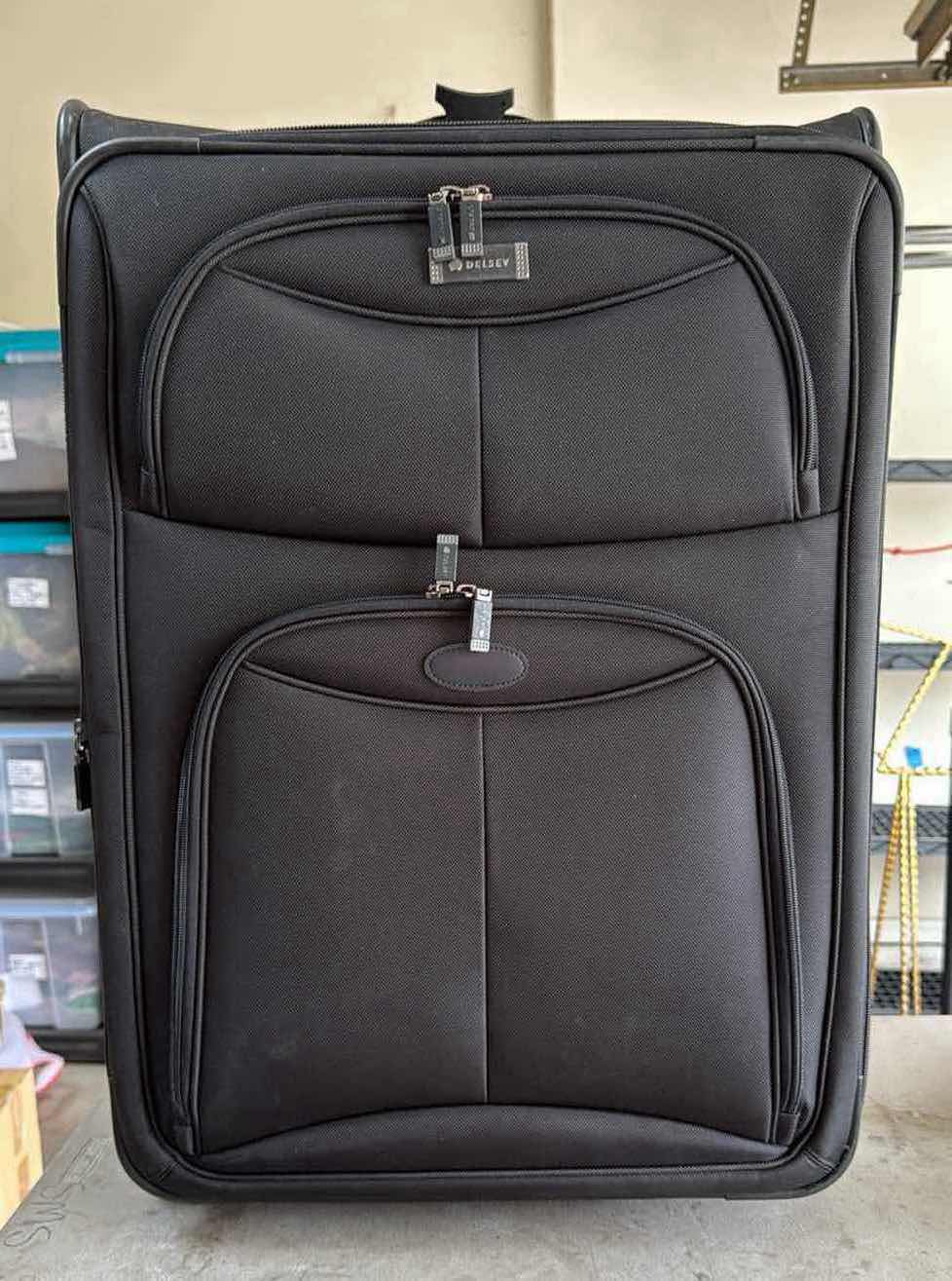 Photo 1 of BLACK DELSEY 30” SOFT SIDE LIGHT WEIGHT LUGGAGE