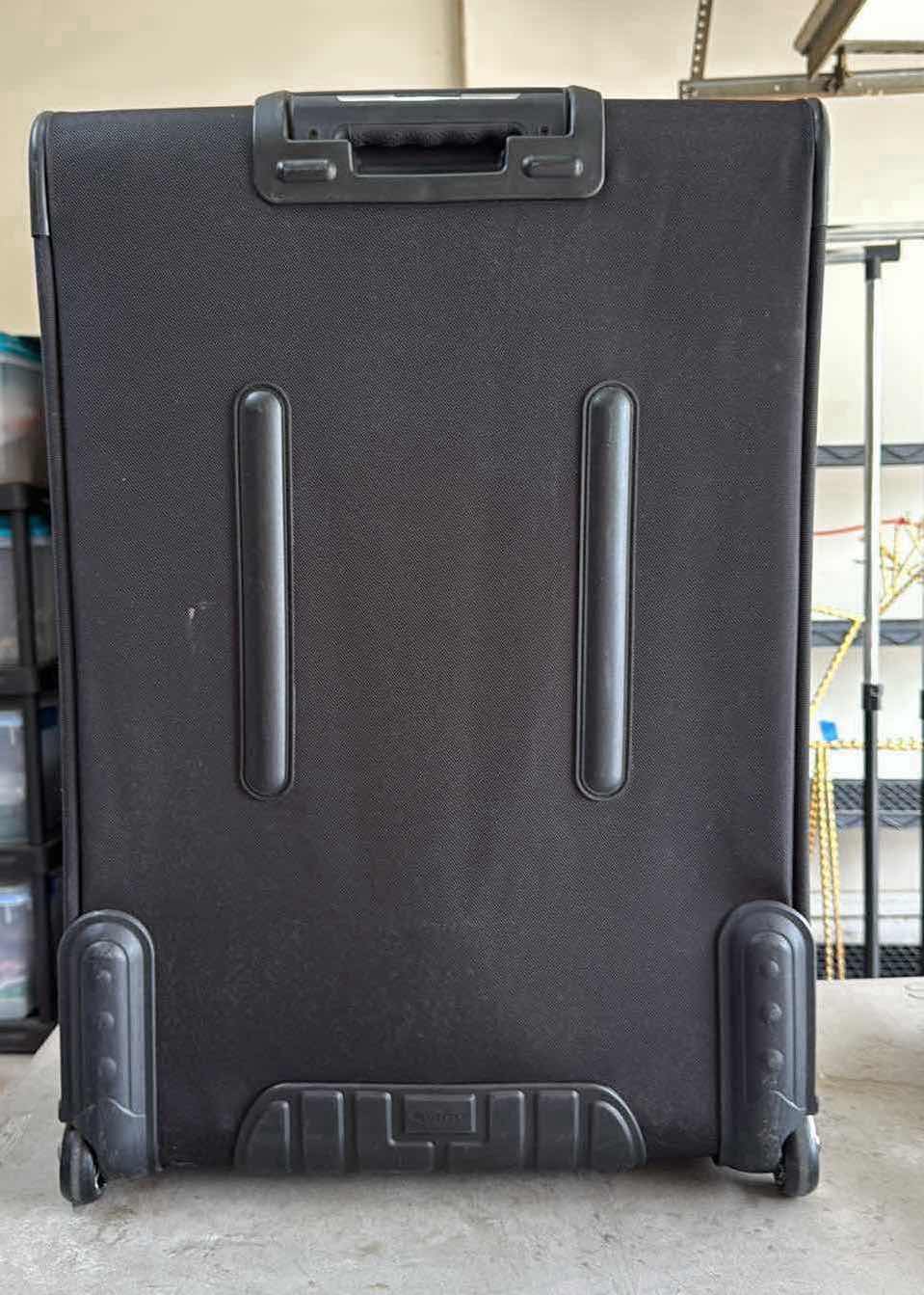 Photo 1 of BLACK DELSEY 30” SOFT SIDE LIGHT WEIGHT LUGGAGE