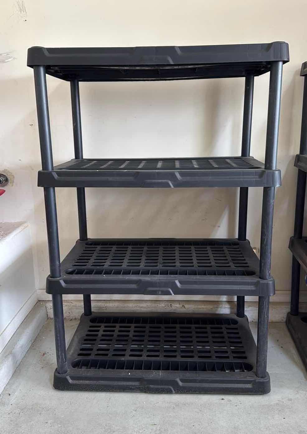 Photo 1 of BLACK PLASTIC SHELVING UNIT 35” x 24” H54”