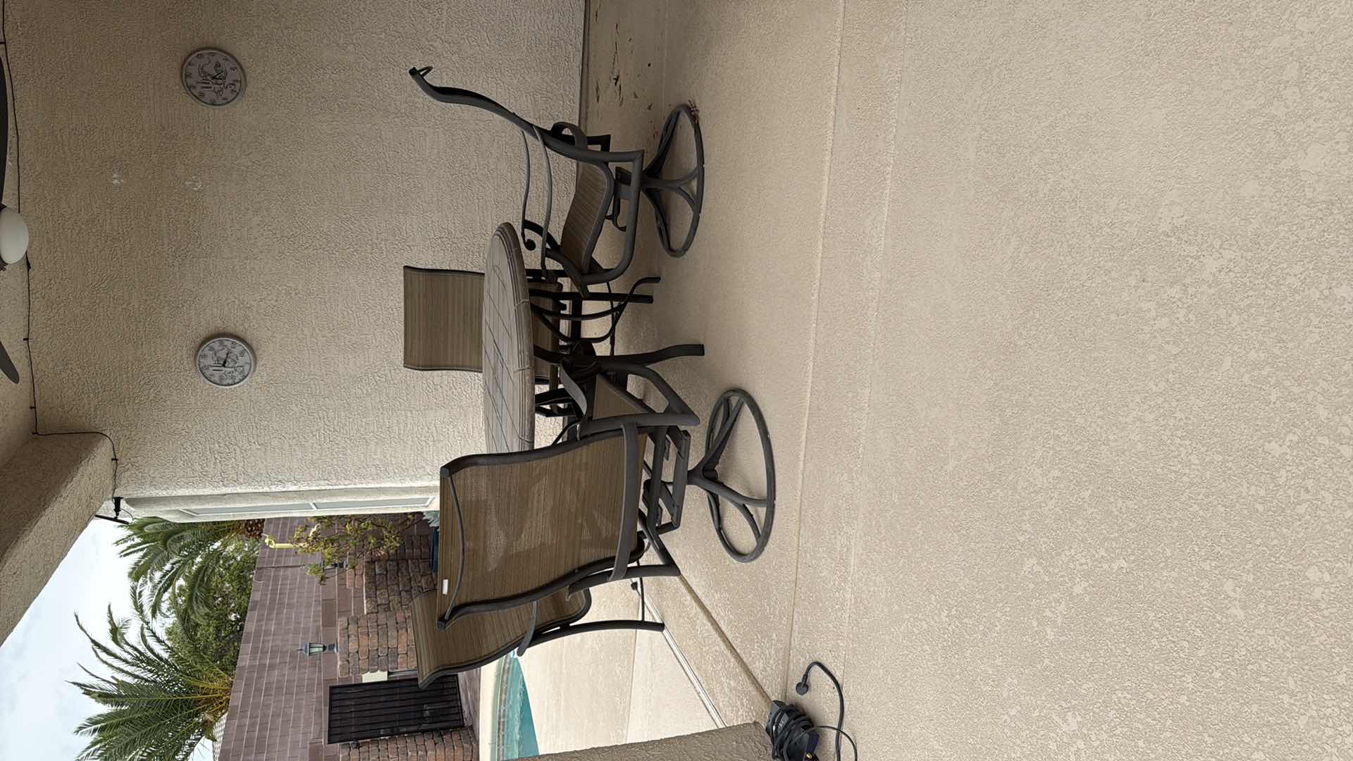 Photo 1 of 50” ROUND HEAVY PATIO TABLE W 2 ARM SWIVEL CHAIRS & 2 ARM CHAIRS