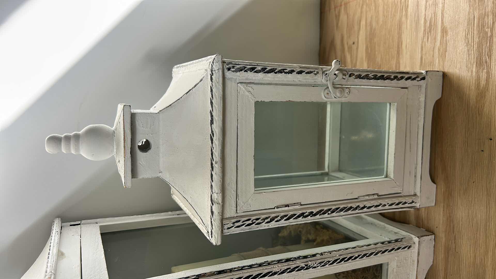 Photo 1 of 2 WHITE WOOD DECORATIVE LANTERNS ( TALLEST H 22”)