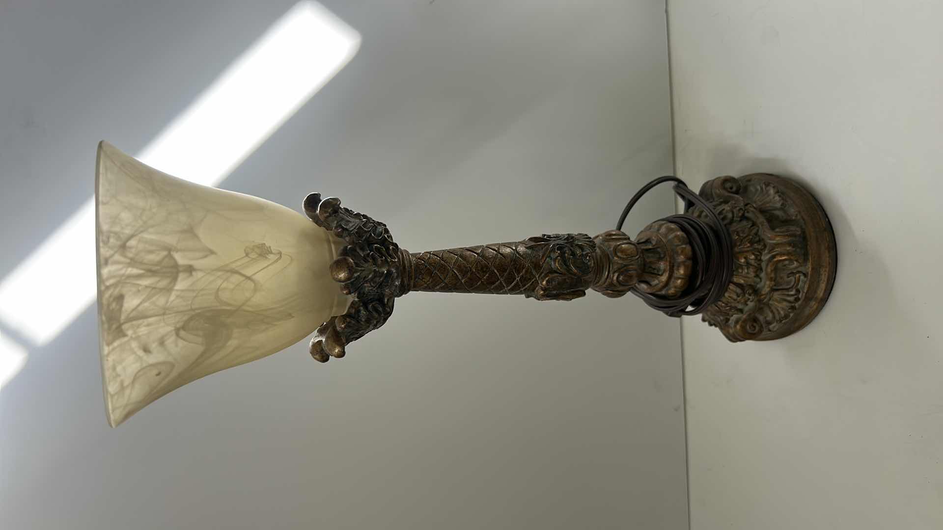 Photo 1 of GOLD TONE CERAMIC LAMP AND IVORY SWIRLED GLASS SHADE H19”