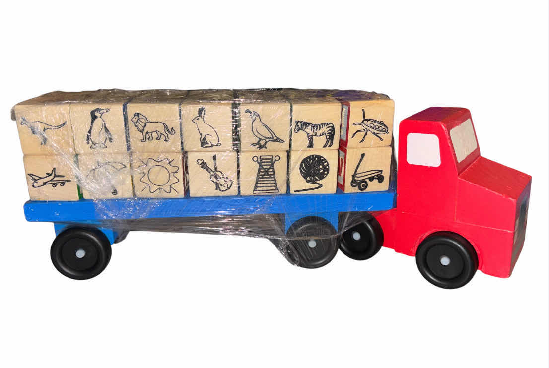 Photo 1 of MELISSA & DOUG WOODEN TRUCK & TRAILER W 28 ALPHABET BLOCKS