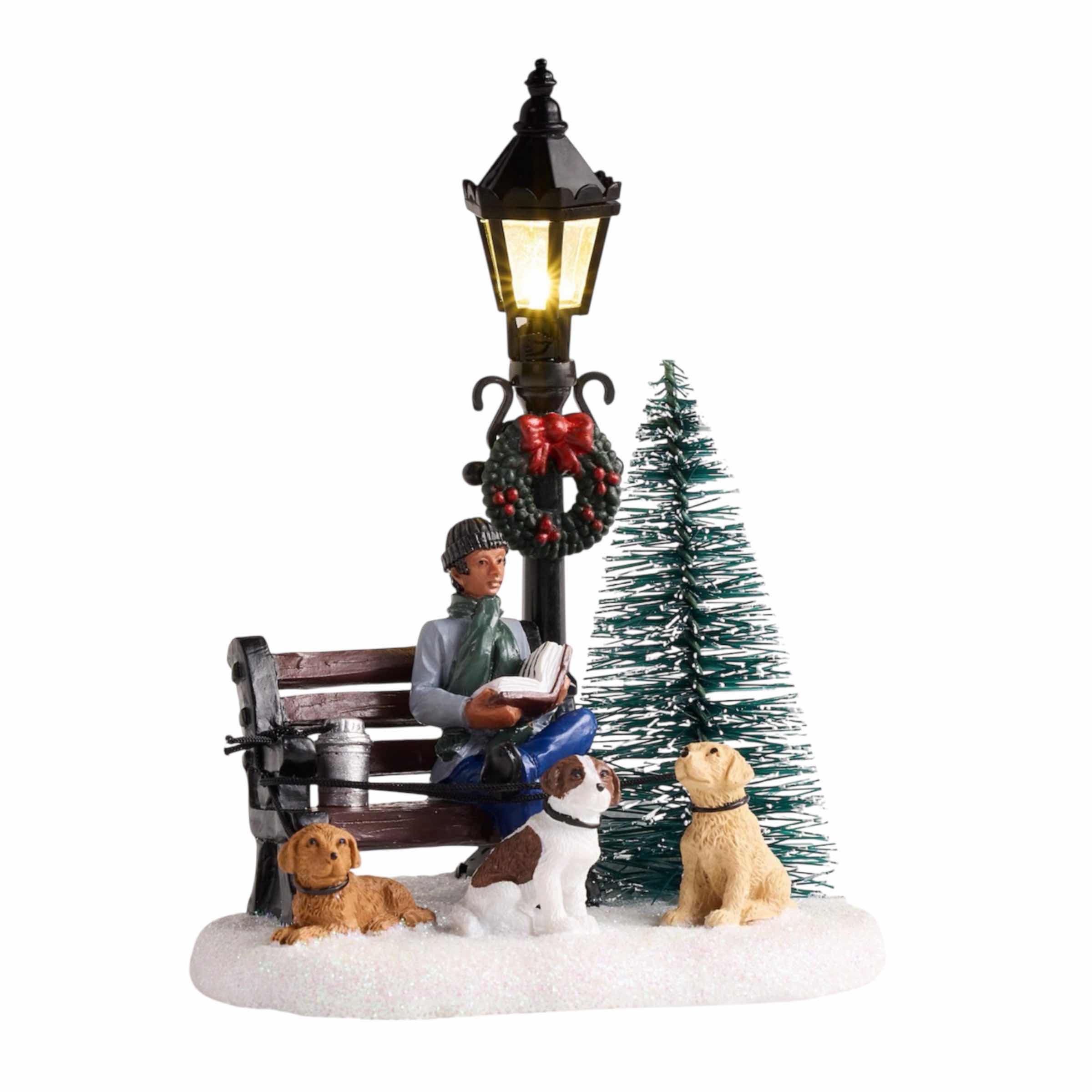 Photo 1 of ST. NICHOLAS SQUARE ILLUMINATED BATTERY OPERATED VILLAGE TABLE DECOR- MAN WITH DOGS