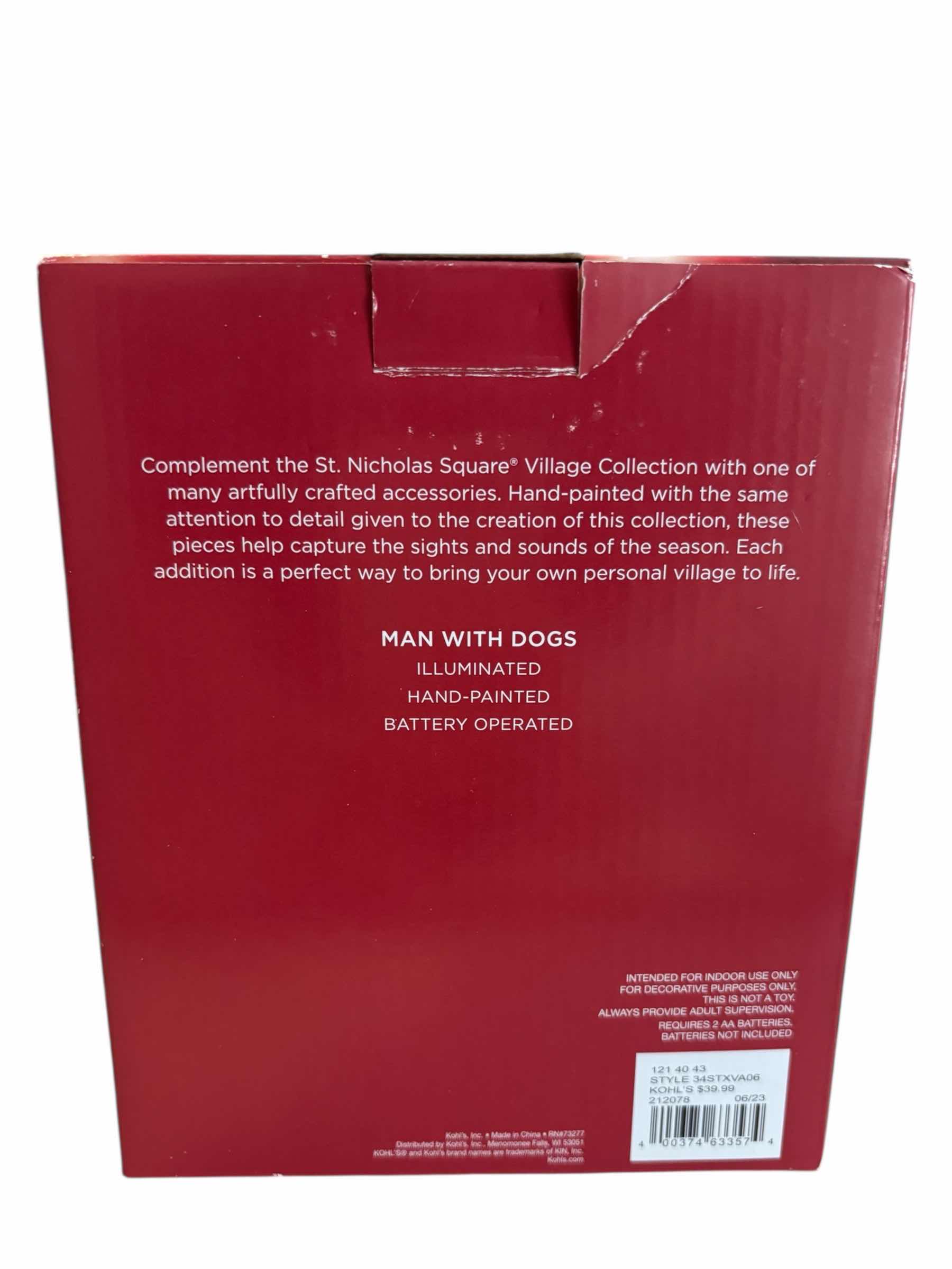 Photo 1 of ST. NICHOLAS SQUARE ILLUMINATED BATTERY OPERATED VILLAGE TABLE DECOR- MAN WITH DOGS