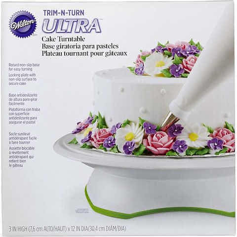 Photo 1 of WILTON TRIM 'N TURN ULTRA CAKE DECORATING 12” TURNTABLE, GREEN/WHITE
