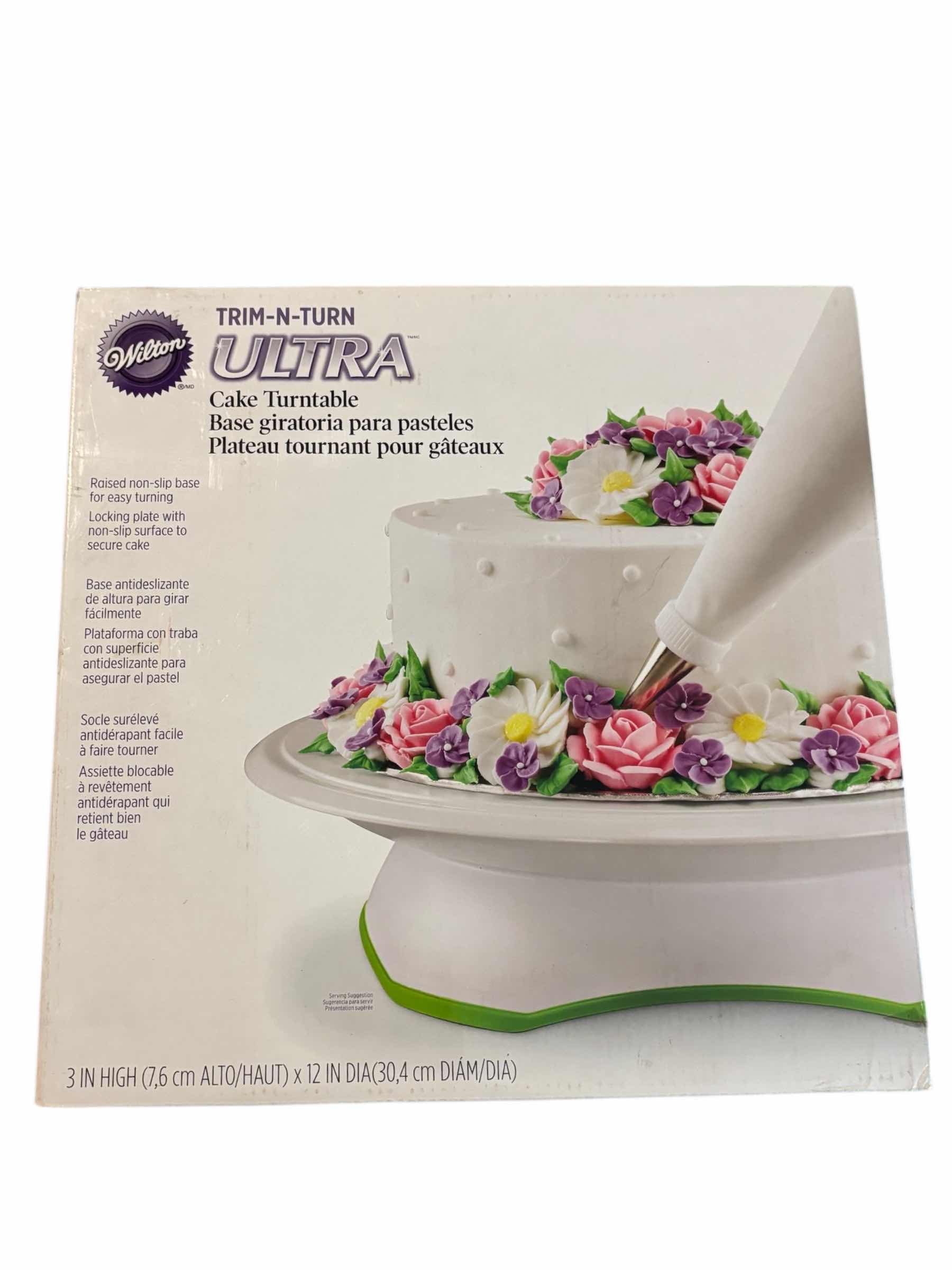 Photo 1 of WILTON TRIM 'N TURN ULTRA CAKE DECORATING 12” TURNTABLE, GREEN/WHITE