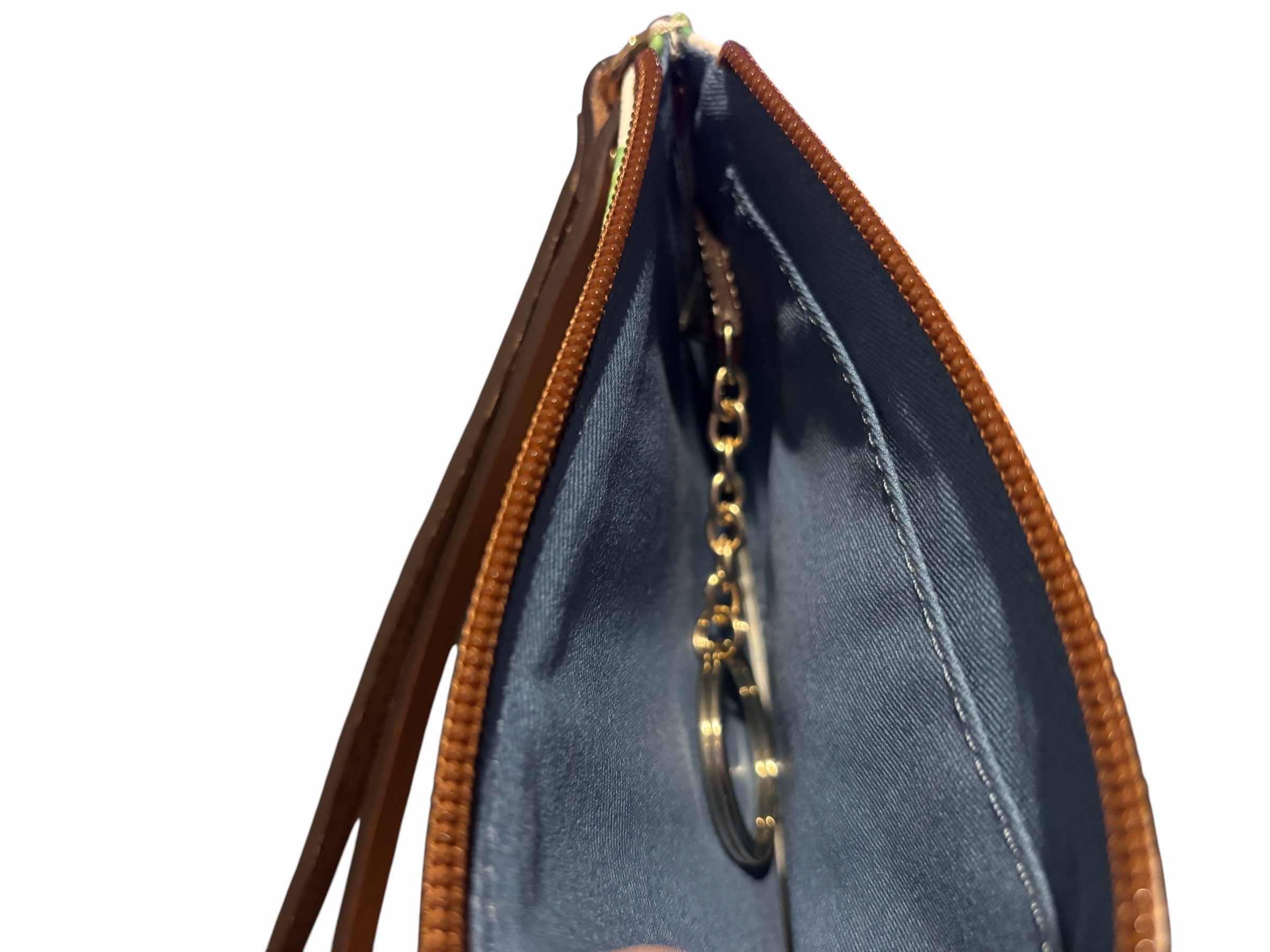 Photo 1 of DOONEY & BOURKE BUTTERCUPS DRAWSTRING SHOULDER BUCKET BAG & MATCHING WRISTLET BAG, INCLUDES DUST BAG  $365