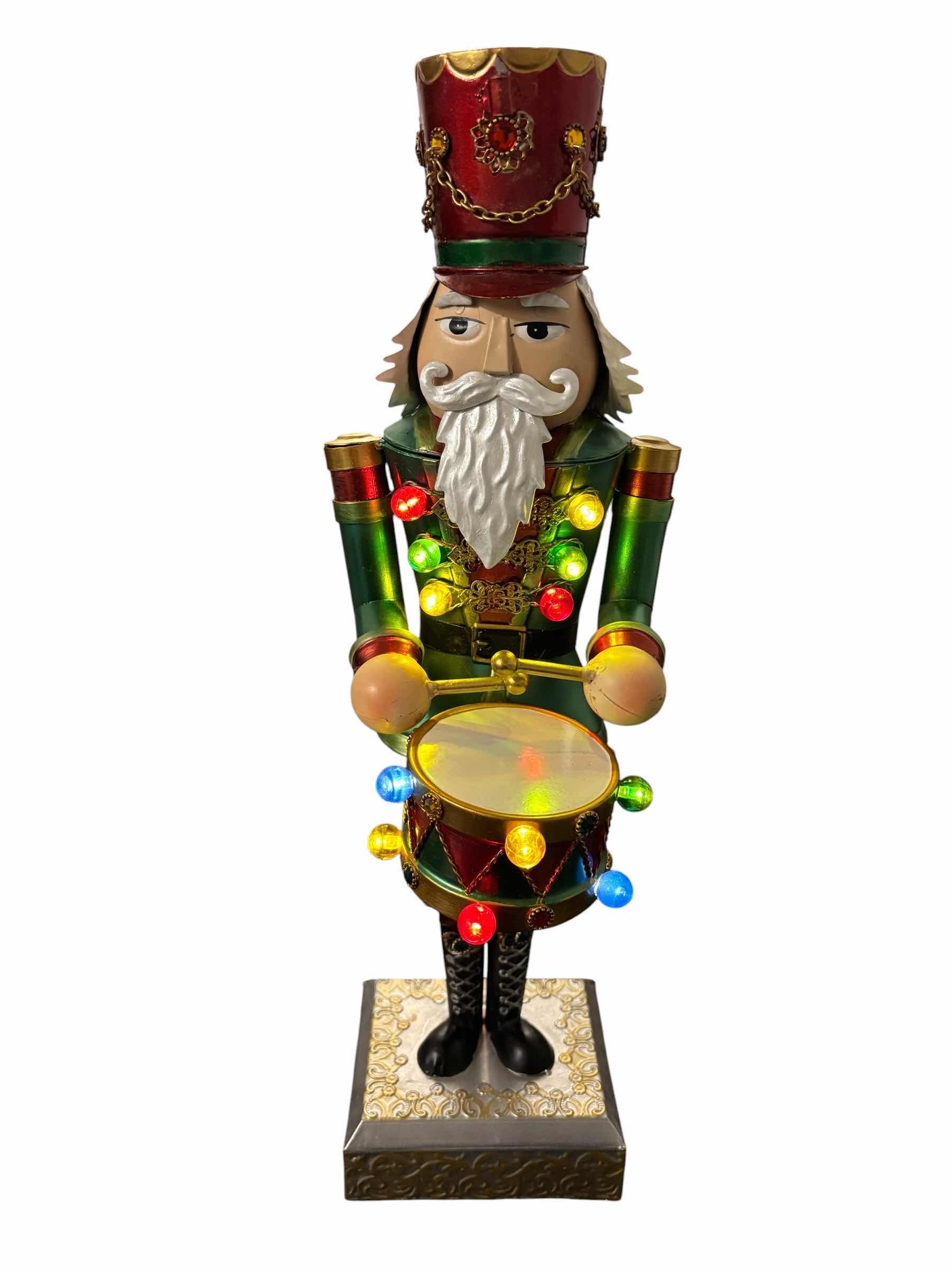 Photo 1 of 21” TIN LIGHT-UP NUTCRACKER $55
