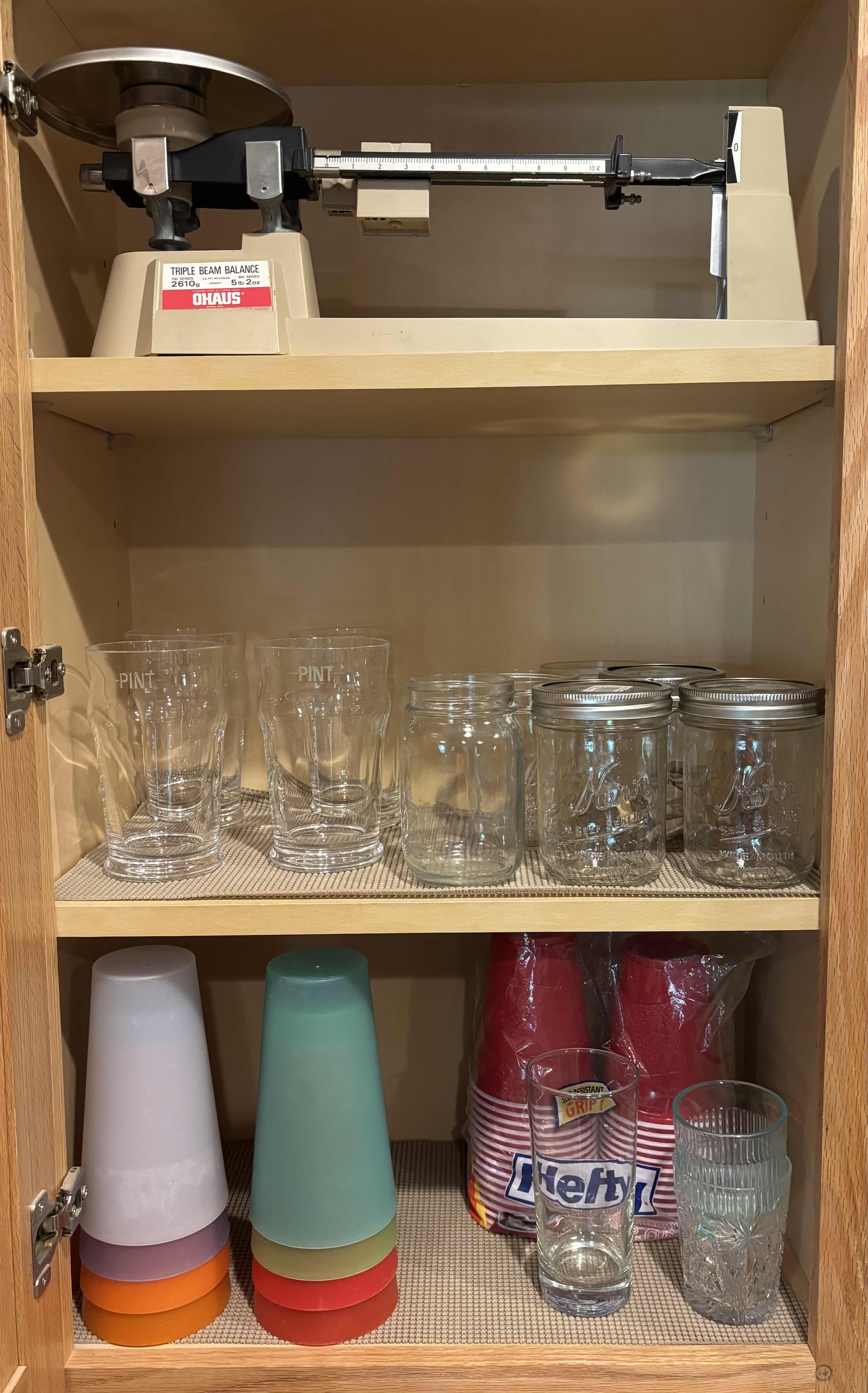 Photo 1 of CONTENTS OF KITCHEN CABINET