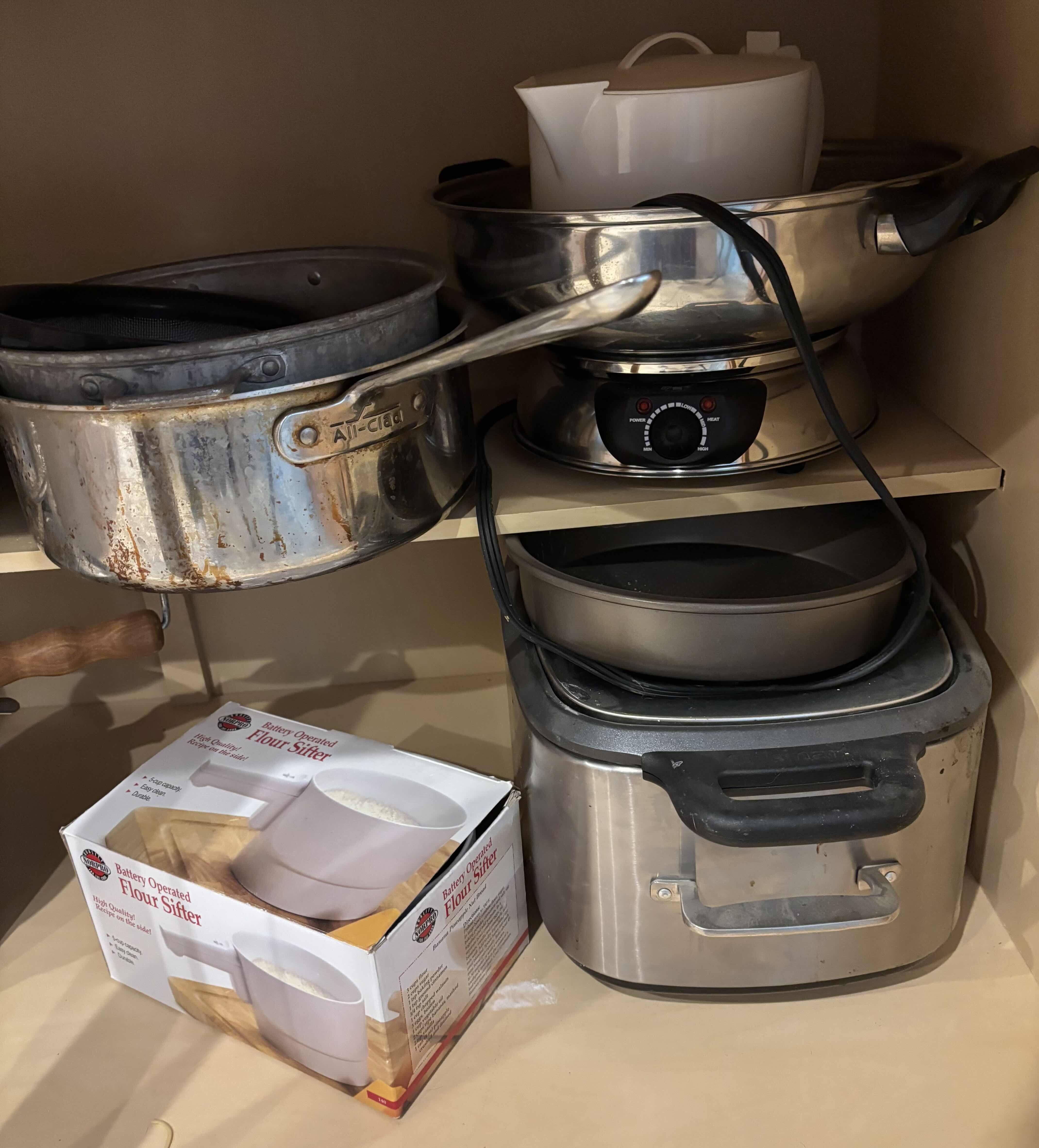 Photo 1 of CONTENTS OF KITCHEN CABINET