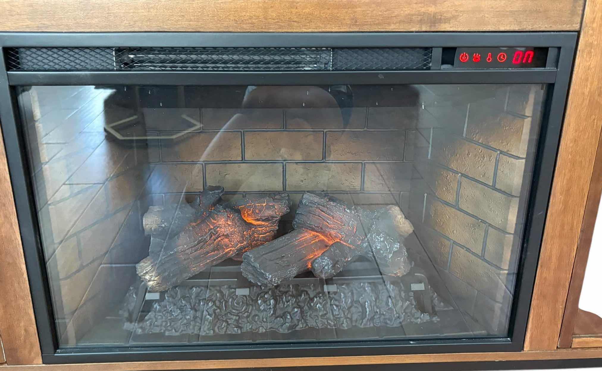 Photo 1 of DARK BROWN WALNUT STYLE TV AND FIREPLACE CONSOLE W REMOTE 66”X18”H31.5”