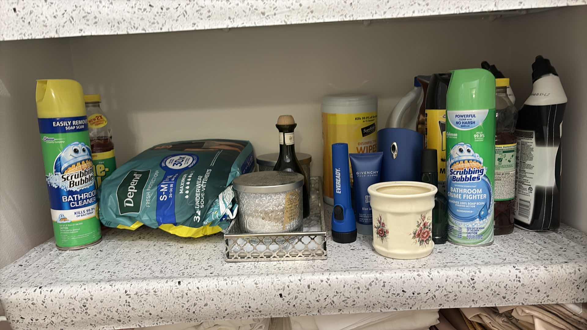 Photo 1 of HALLWAY CLOSET OF HYGIENE PRODUCTS AND CLEANING SUPPLIES