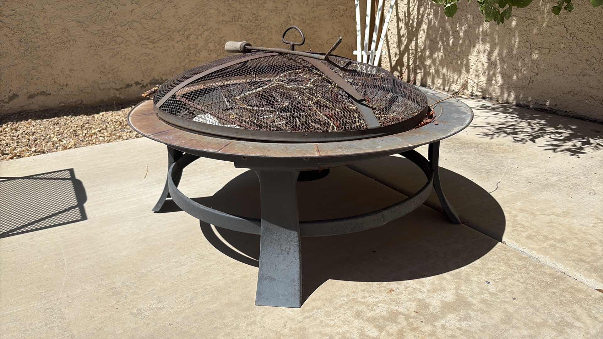 Photo 1 of METAL OUTDOOR FIRE-PIT W FIRE POKER D32”