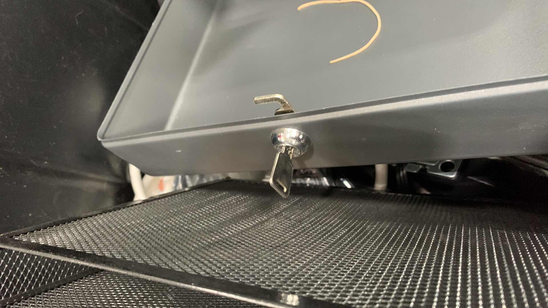 Photo 1 of CONTAINER OF MONITOR STANDS, LOCK BOX WITH KEY AND OFFICE MATERIALS