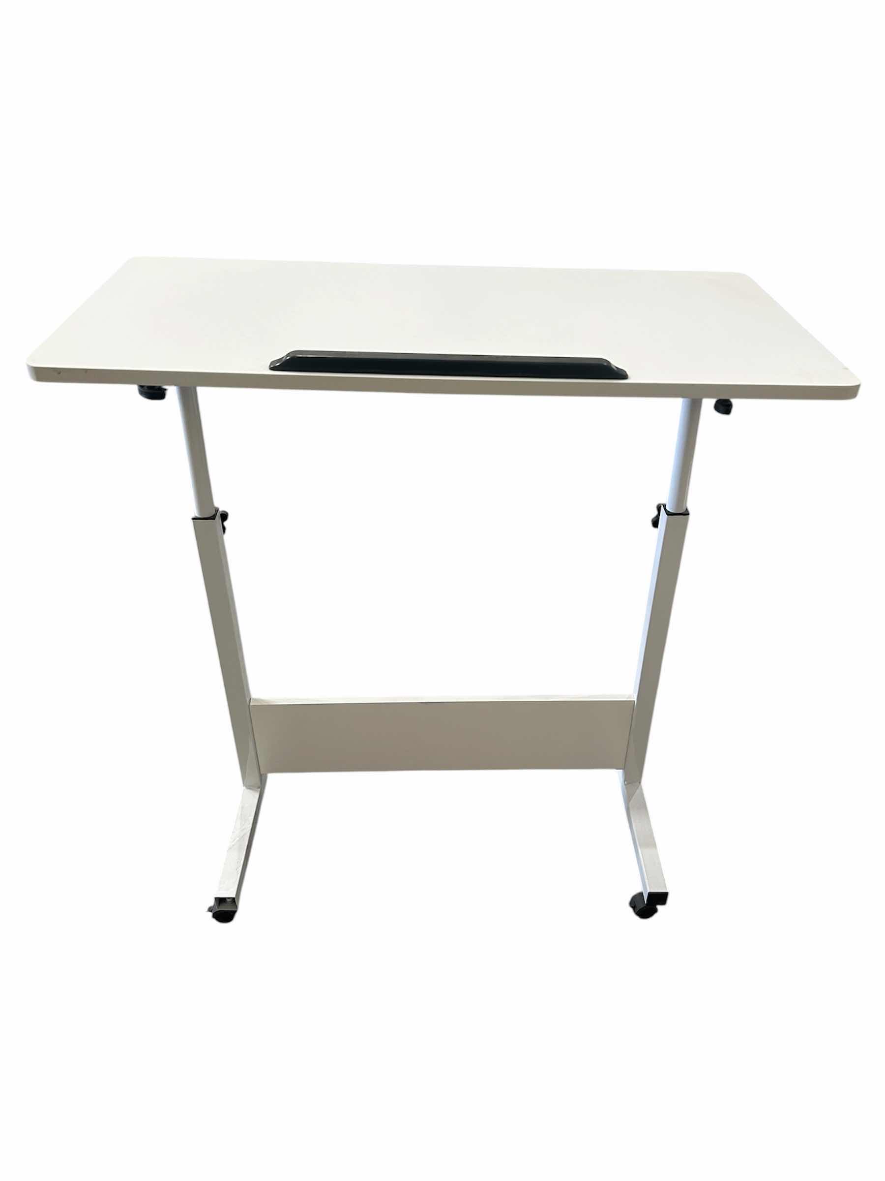 Photo 1 of MOBILE STANDING WHITE DESK W ADJUSTABLE HEIGHT TILT ANGLE 31" X 16" H 32"