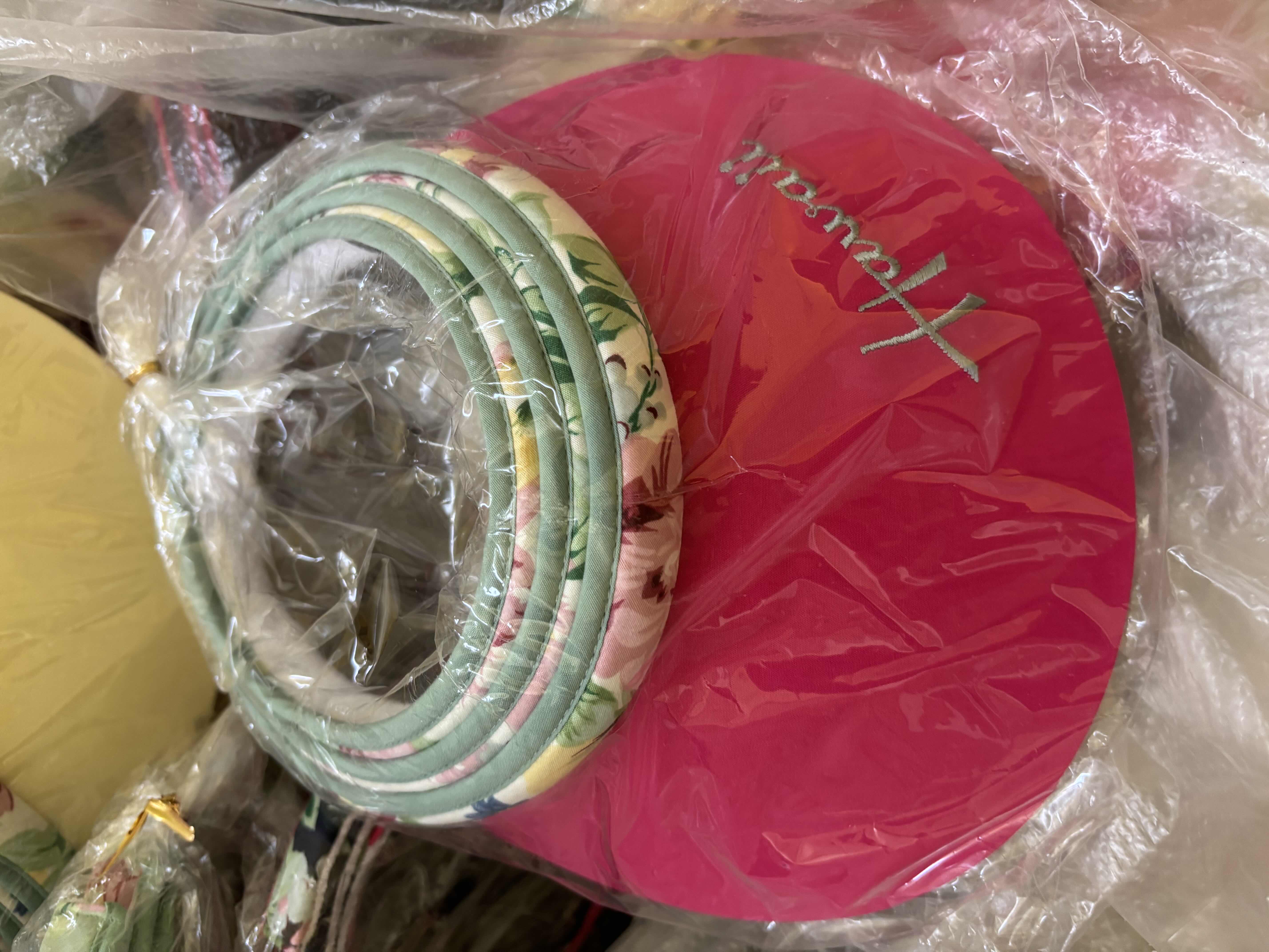 Photo 1 of LARGE BAG OF VISORS IN MULTIPLE COLORS & STYLES