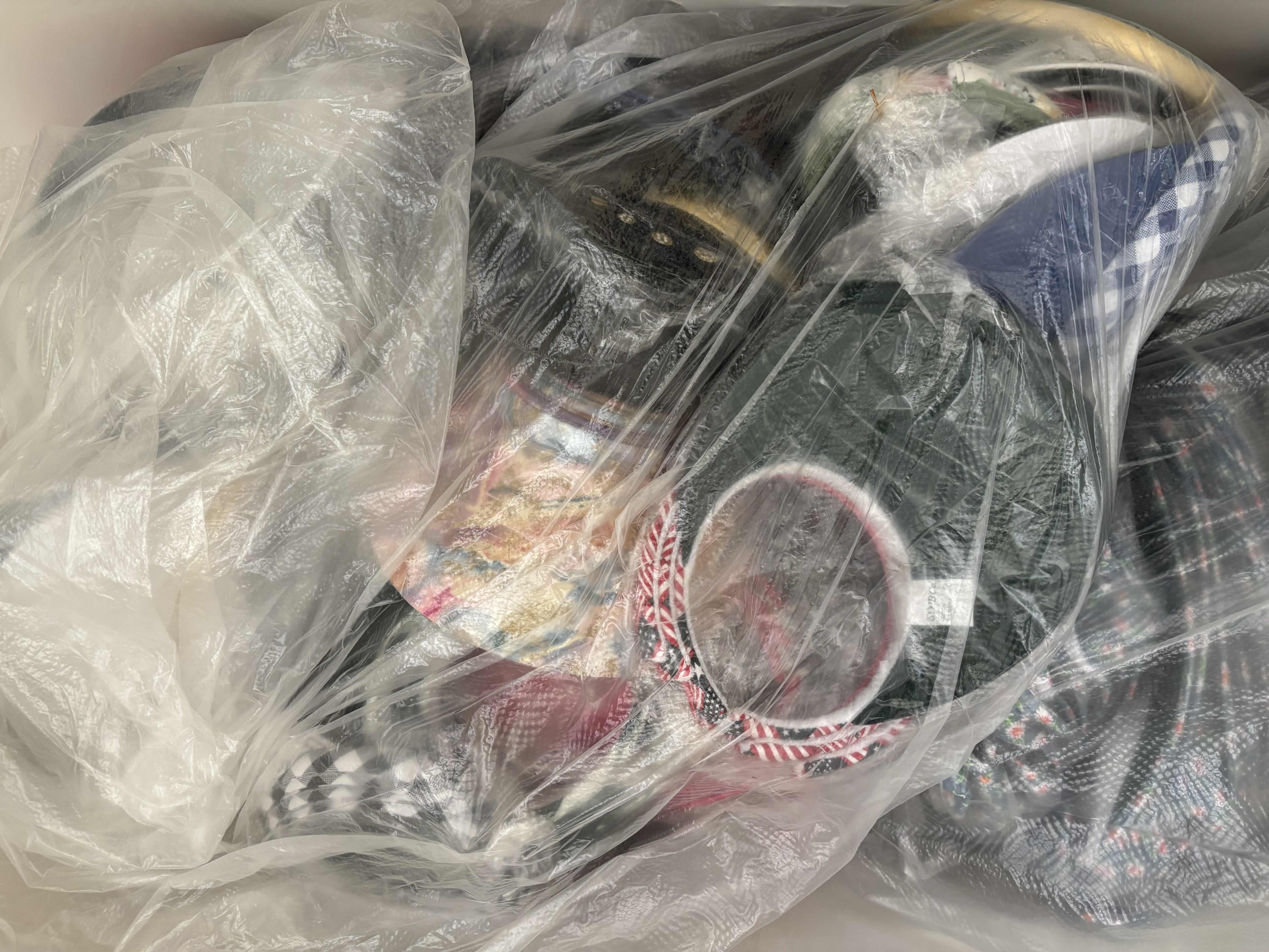 Photo 1 of LARGE BAGS OF VISORS IN MULTIPLE COLORS & STYLES