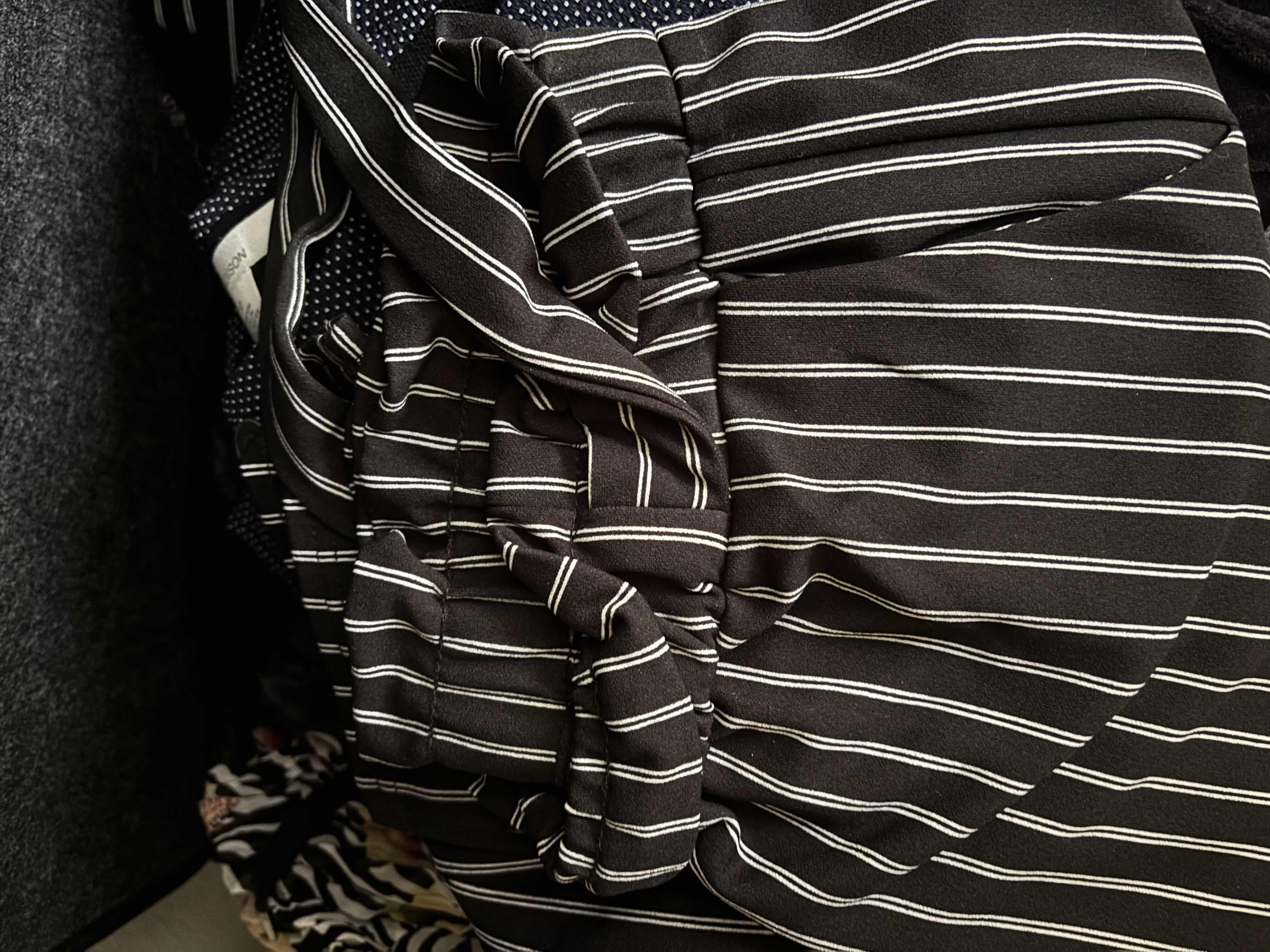 Photo 1 of CONTAINER FULL OF WOMENS CLOTHES SIZE M-L