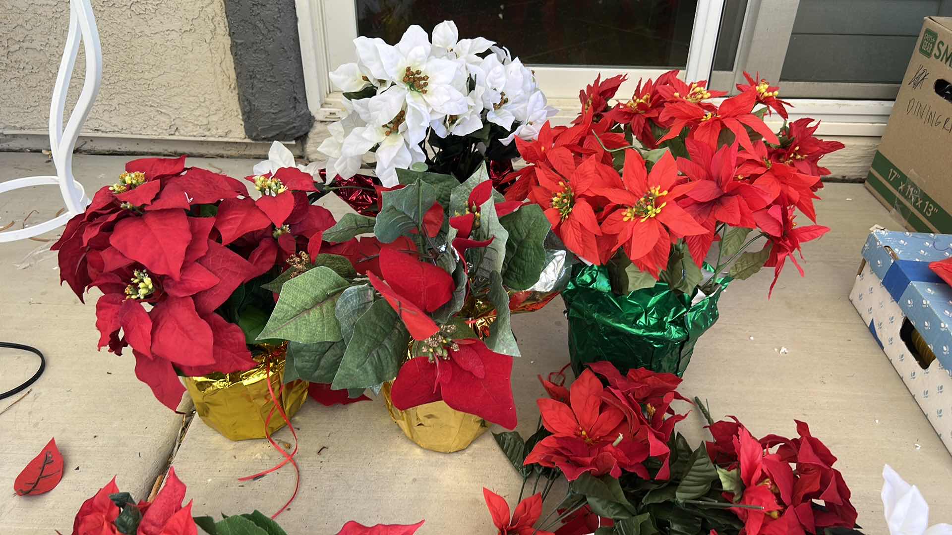 Photo 1 of POINSETTIAS FAUX PLANTS AND SWAGS