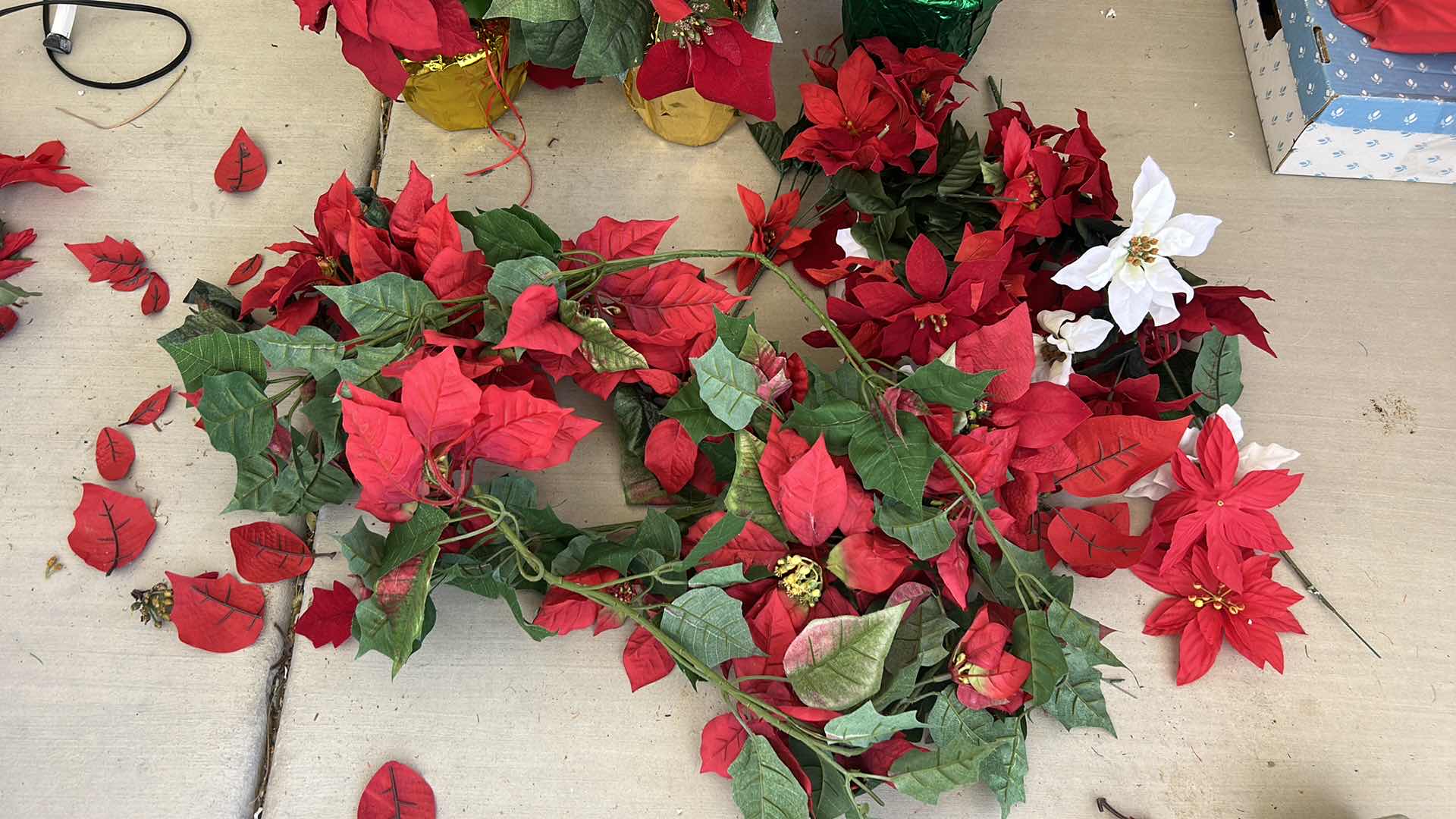 Photo 1 of POINSETTIAS FAUX PLANTS AND SWAGS